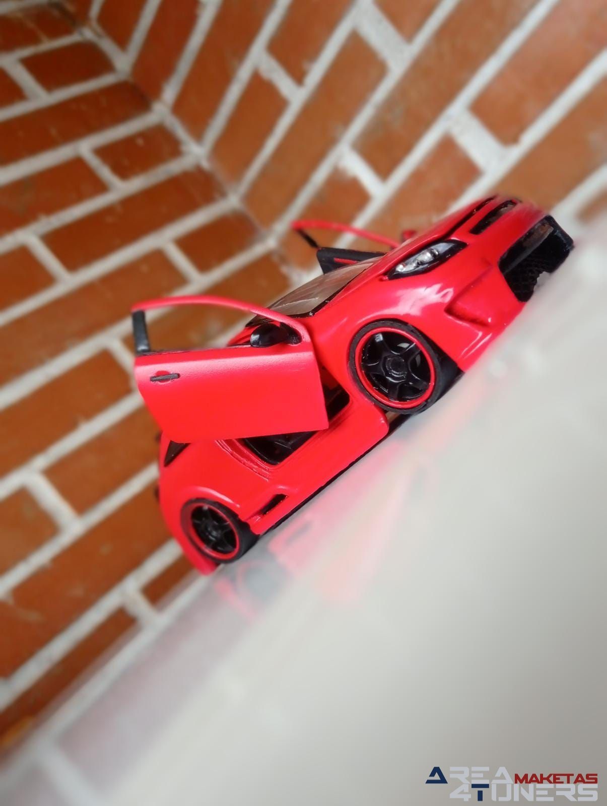 Reportaje maqueta Tuning Opel Astra Astru Imagen perteneciente al reportaje fotográfico de la revista Tuning de publicación diaria Area4tuners.es sobre una maqueta Tuning 1:24 Opel Astra