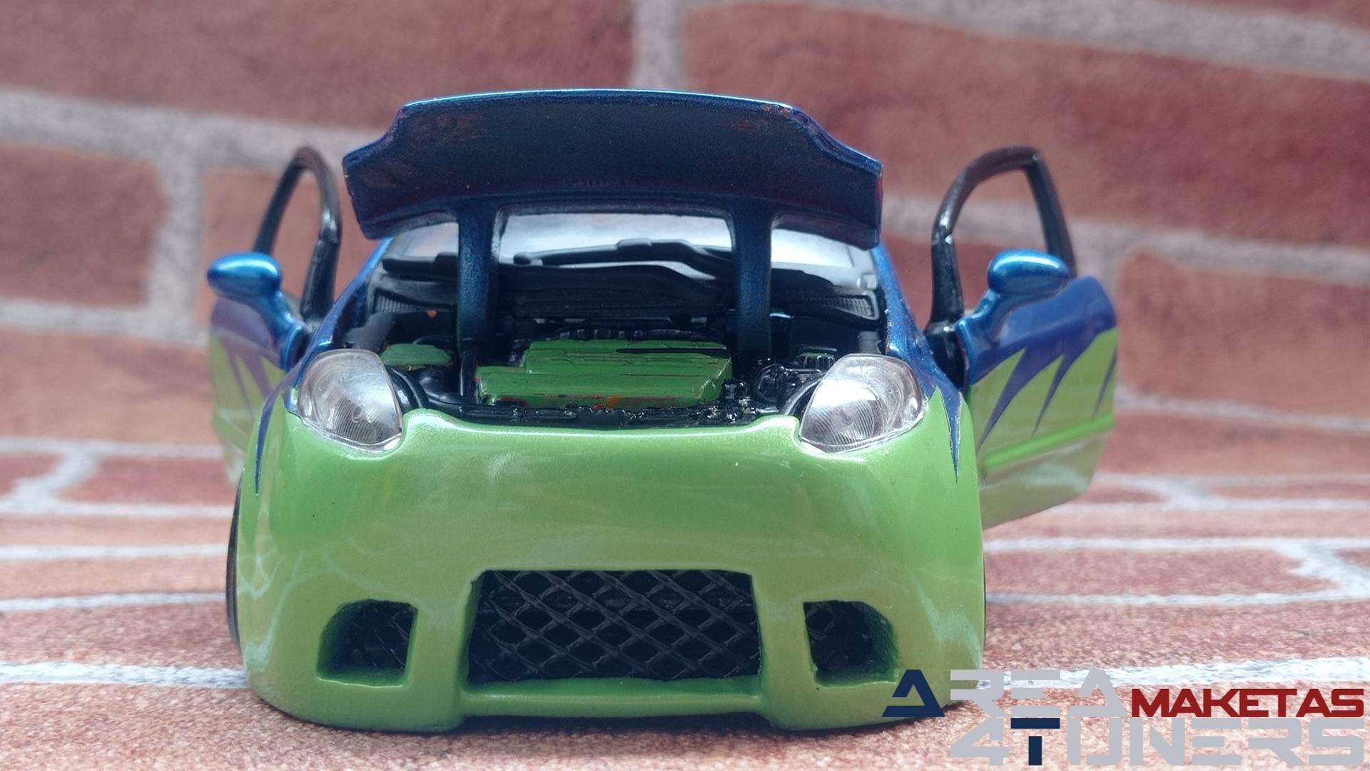Reportaje maqueta Tuning Fiat Punto On Point Imagen perteneciente al reportaje fotográfico de la revista Tuning de publicación diaria Area4tuners.es sobre una maqueta Tuning  1:24 Fiat Punto On Point