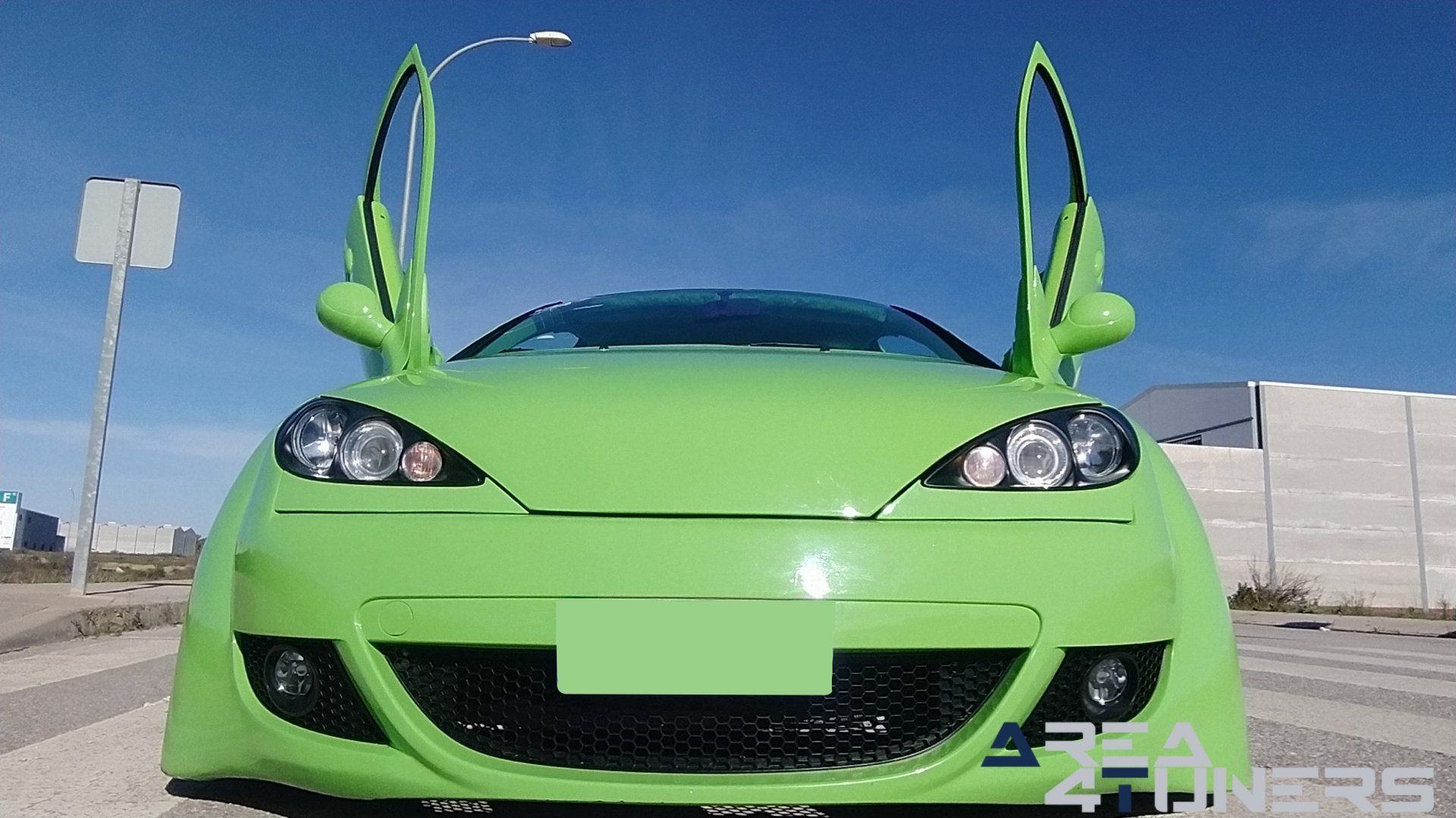 Imagen reportaje coche Tuning Peugeot 206 Mantis Imagen perteneciente al reportaje sobre coche Tuning, de la revista Area4tuners sobre un Peugeot 206