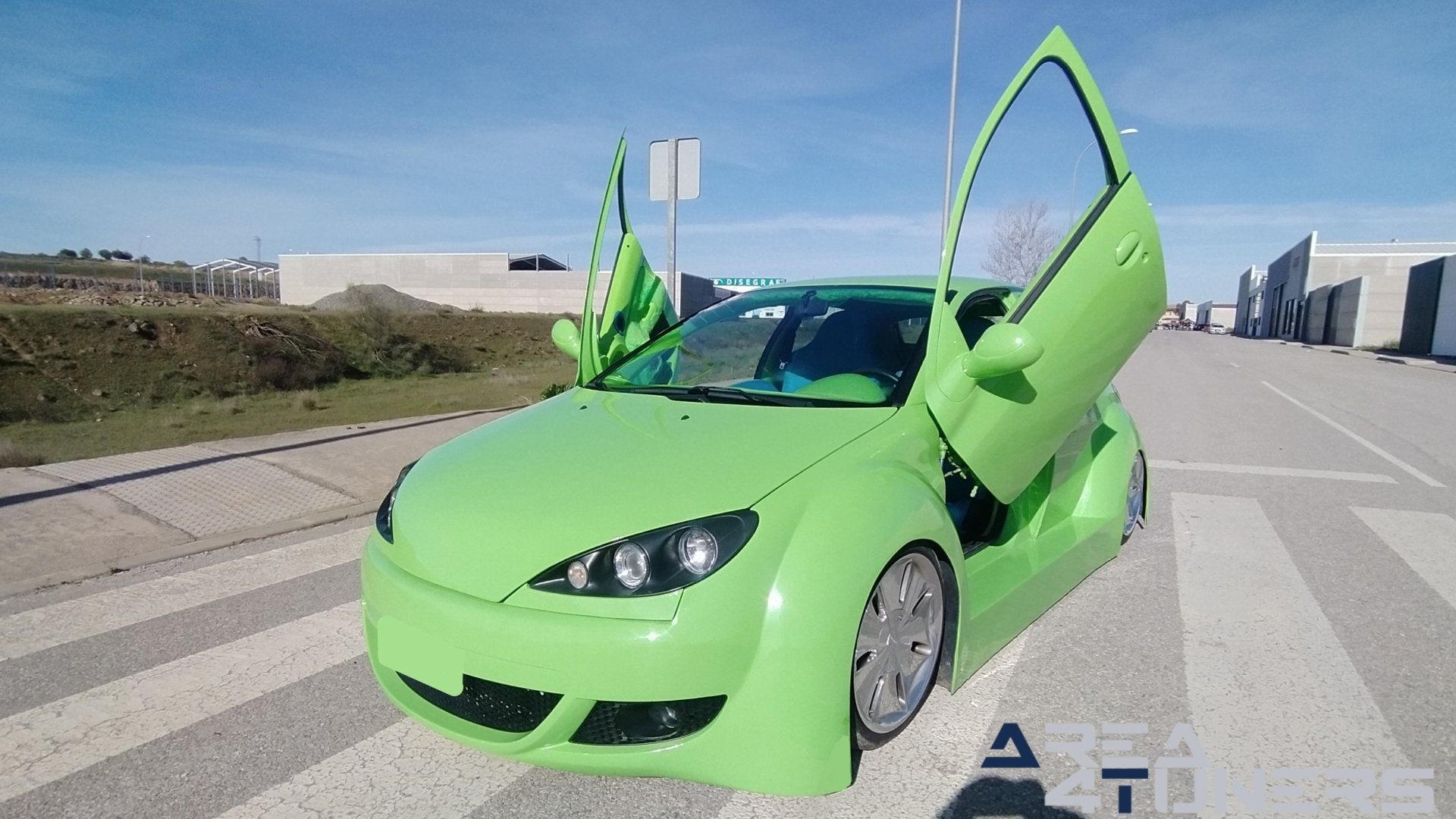 Imagen reportaje coche Tuning Peugeot 206 Mantis Imagen perteneciente al reportaje sobre coche Tuning, de la revista Area4tuners sobre un Peugeot 206