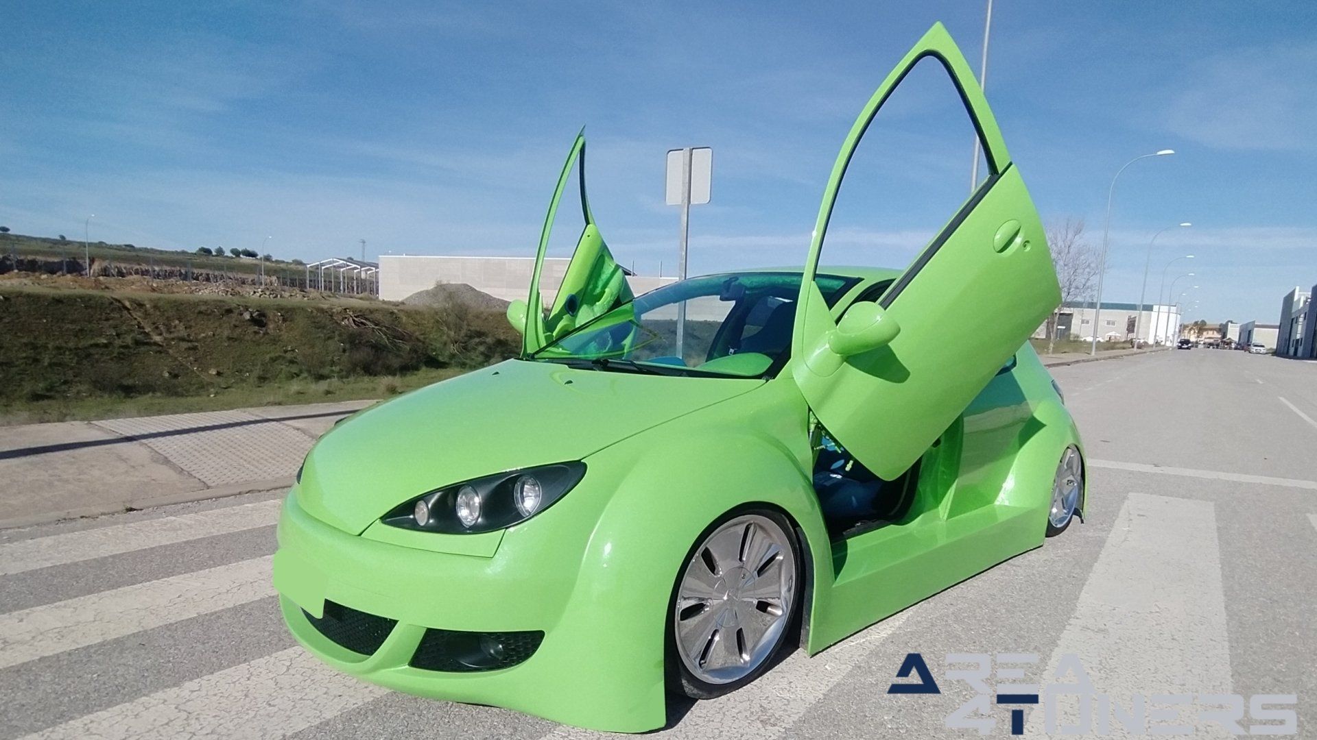 Imagen reportaje coche Tuning Peugeot 206 Mantis Imagen perteneciente al reportaje sobre coche Tuning, de la revista Area4tuners sobre un Peugeot 206