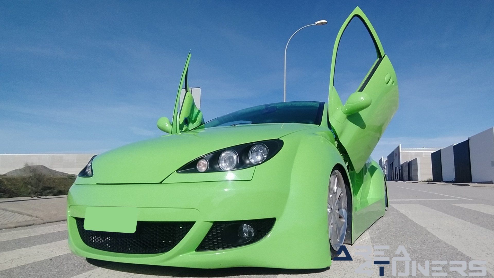 Imagen reportaje coche Tuning Peugeot 206 Mantis Imagen perteneciente al reportaje sobre coche Tuning, de la revista Area4tuners sobre un Peugeot 206