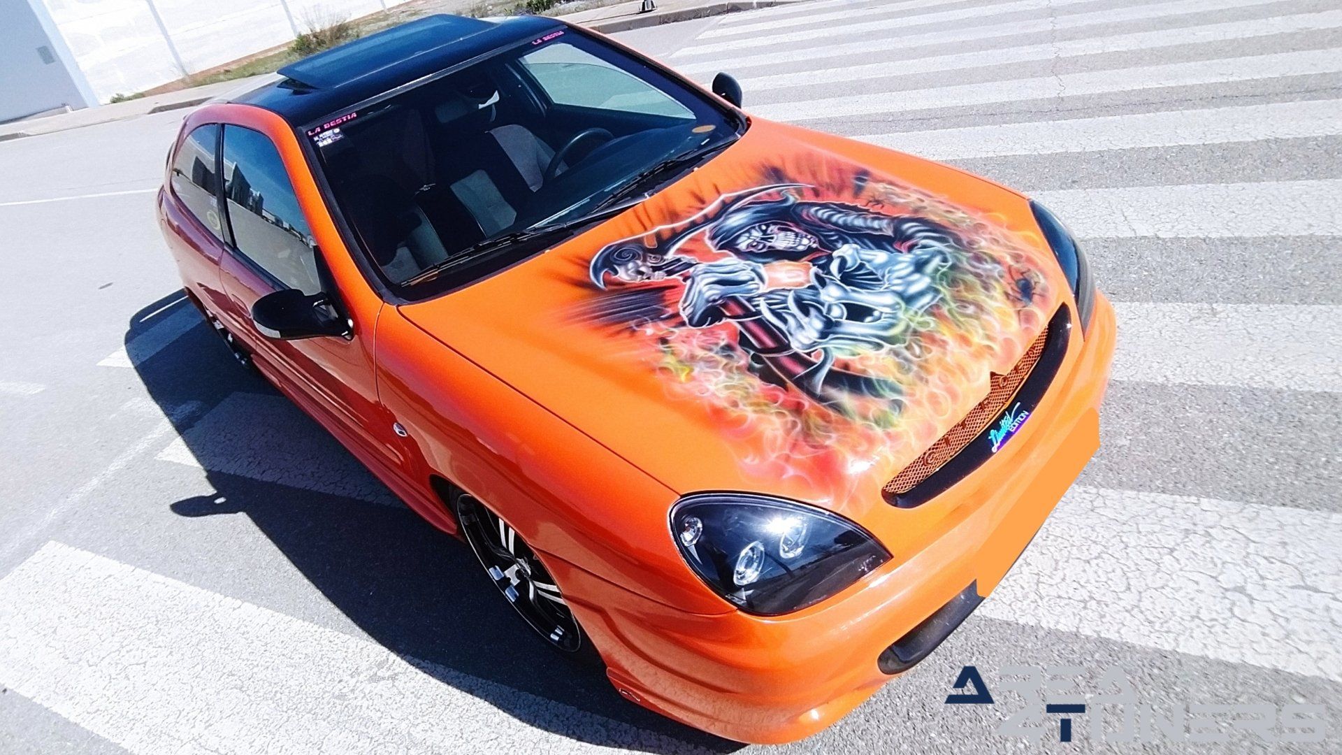 Imagen reportaje coche Tuning Citroën Xsara La Naranja Calavera DJ Imagen perteneciente al reportaje sobre coche Tuning, de la revista Area4tuners sobre un Citroën Xsara