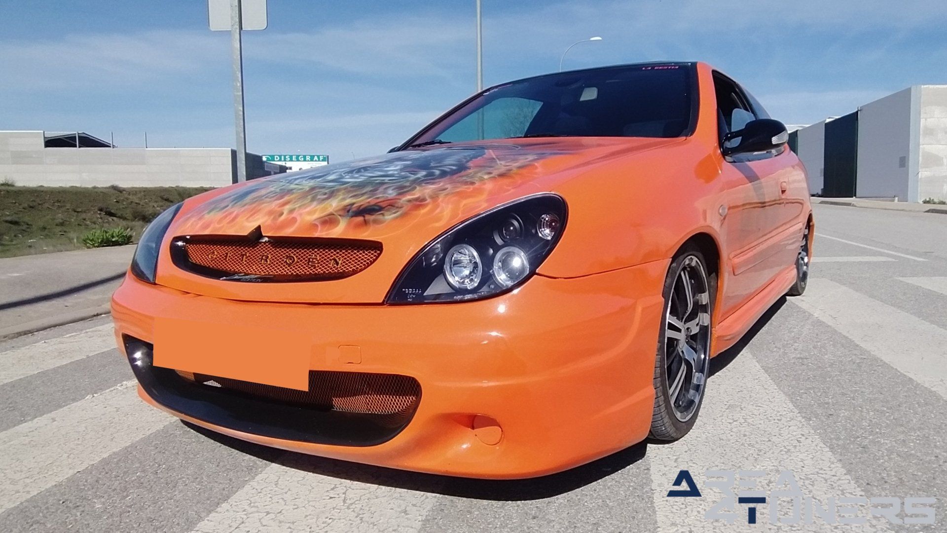Imagen reportaje coche Tuning Citroën Xsara La Naranja Calavera DJ Imagen perteneciente al reportaje sobre coche Tuning, de la revista Area4tuners sobre un Citroën Xsara