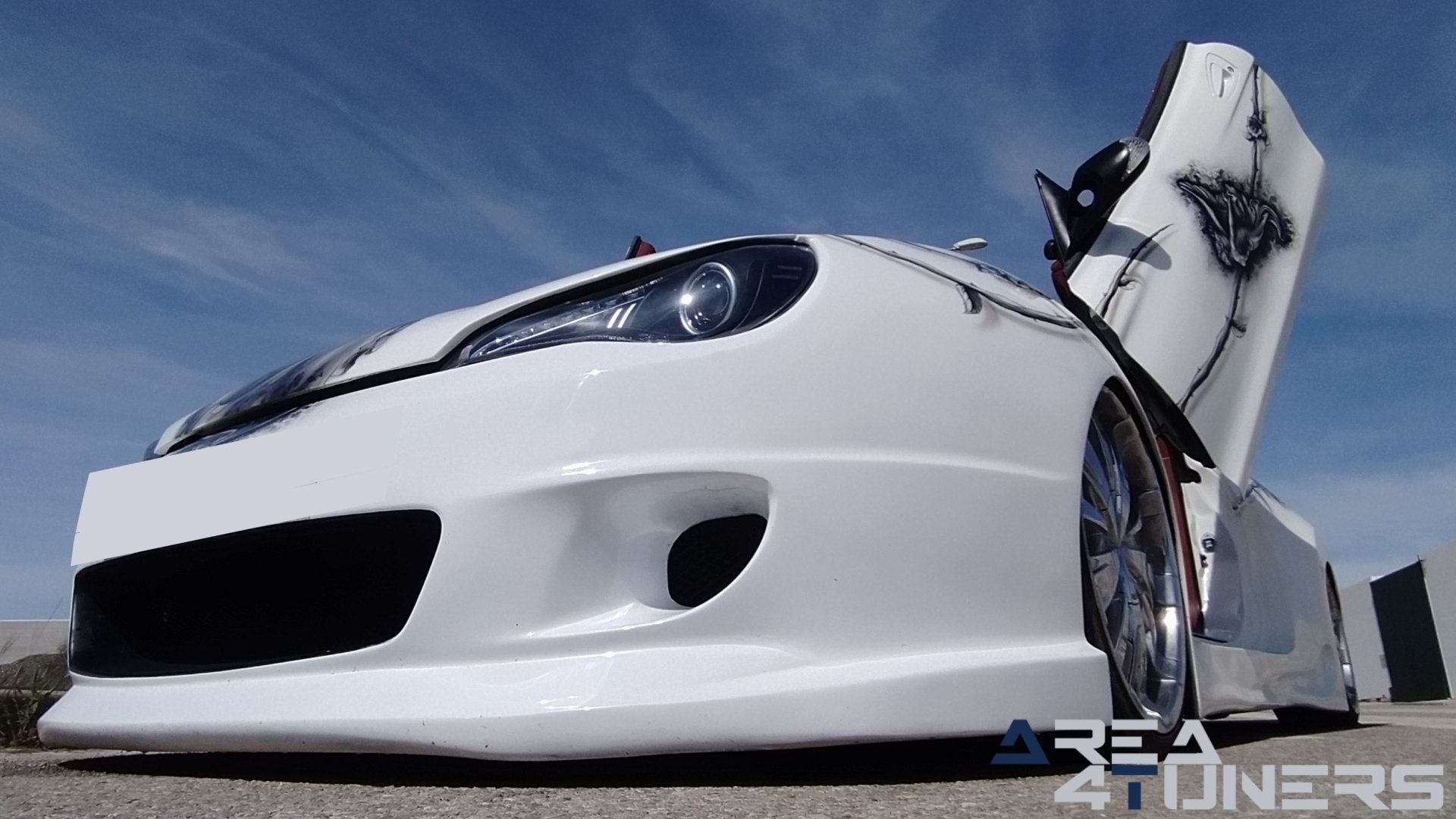 Imagen reportaje coche Tuning Hyundai Coupé White Rose Imagen perteneciente al reportaje de coche Tuning, de la revista Area4tuners sobre un Hyundai Coupé