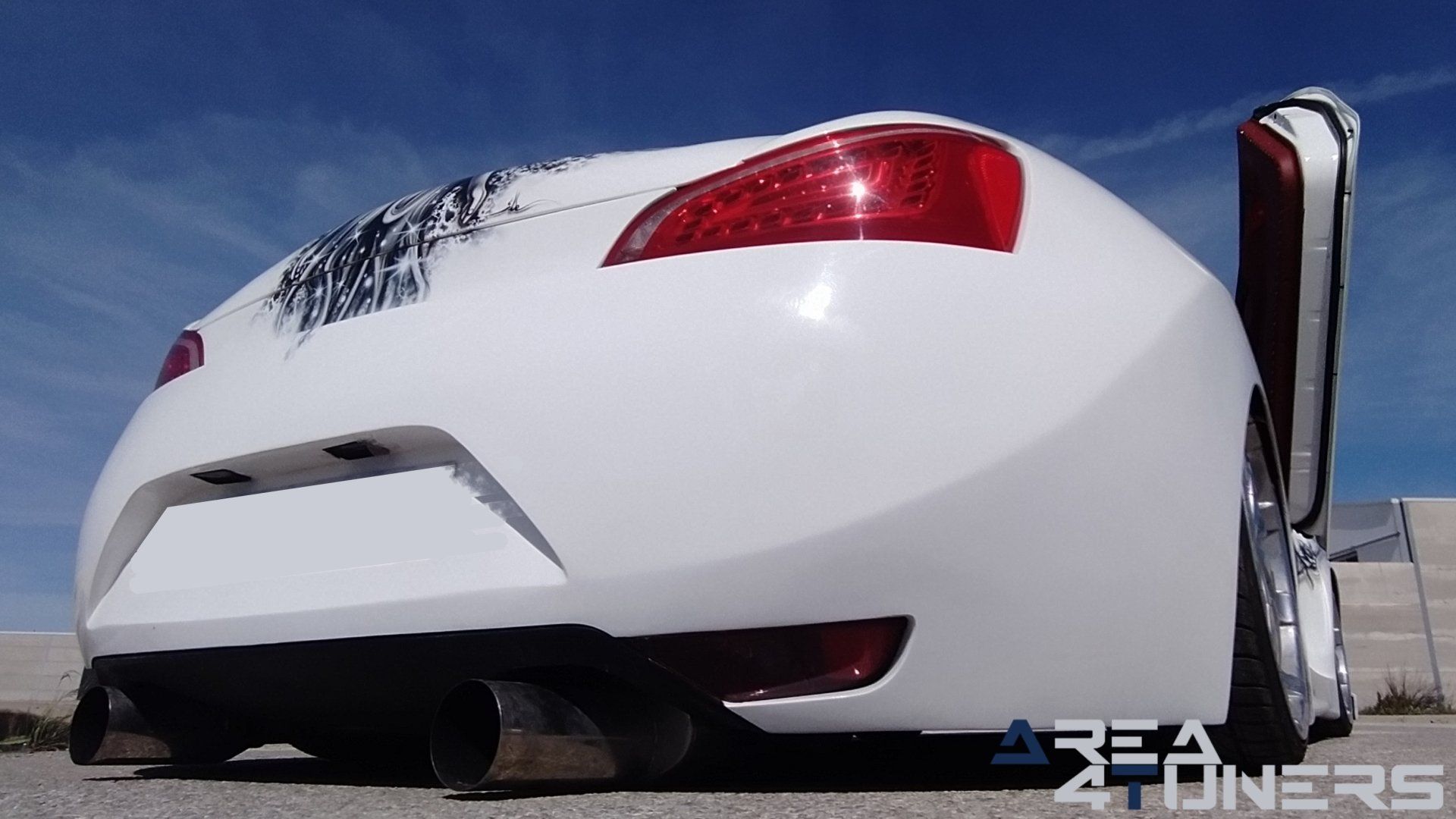 Imagen reportaje coche Tuning Hyundai Coupé White Rose Imagen perteneciente al reportaje de coche Tuning, de la revista Area4tuners sobre un Hyundai Coupé