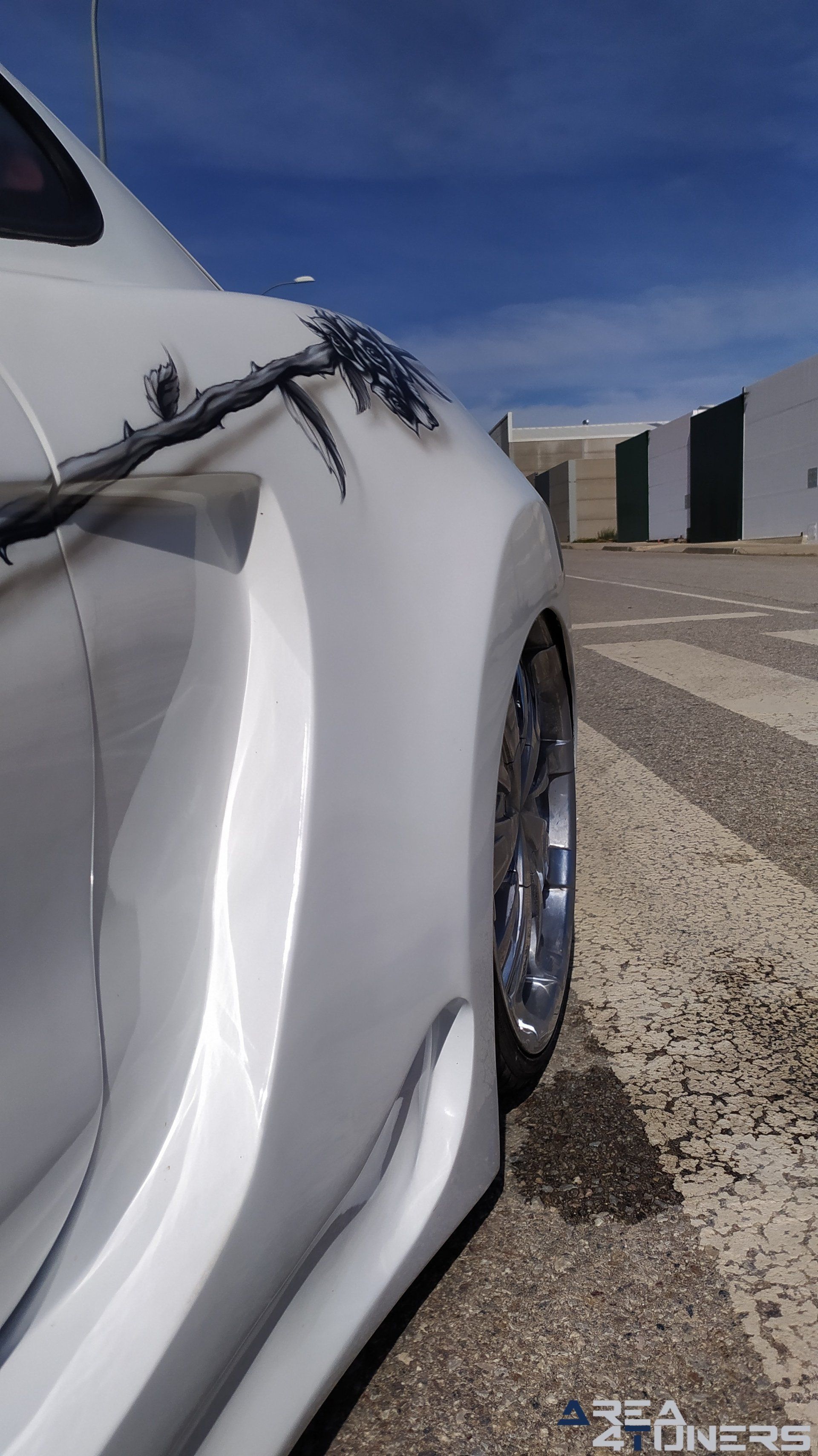 Imagen reportaje coche Tuning Hyundai Coupé White Rose Imagen perteneciente al reportaje de coche Tuning, de la revista Area4tuners sobre un Hyundai Coupé