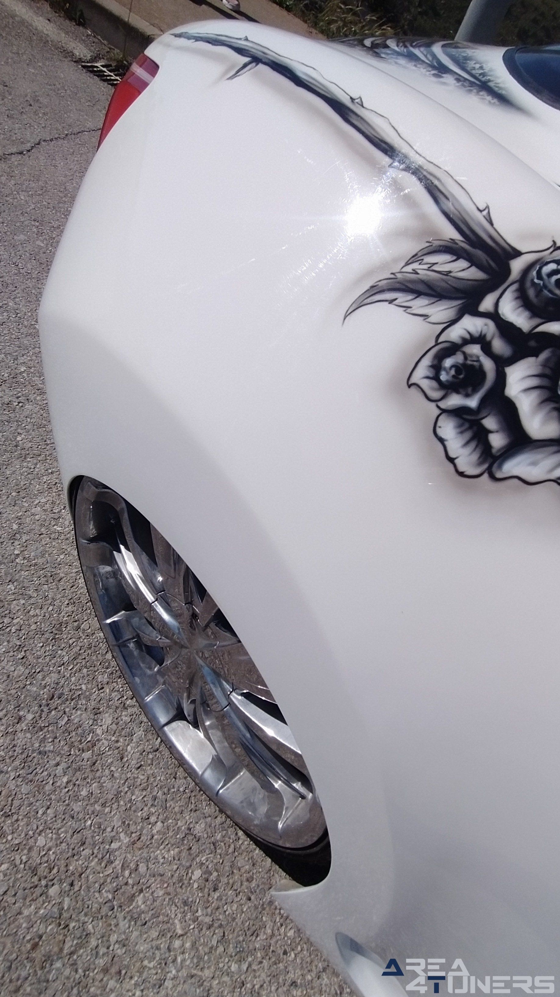 Imagen reportaje coche Tuning Hyundai Coupé White Rose Imagen perteneciente al reportaje de coche Tuning, de la revista Area4tuners sobre un Hyundai Coupé