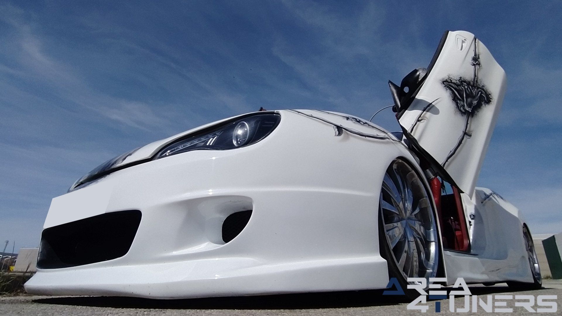 Imagen reportaje coche Tuning Hyundai Coupé White Rose Imagen perteneciente al reportaje de coche Tuning, de la revista Area4tuners sobre un Hyundai Coupé