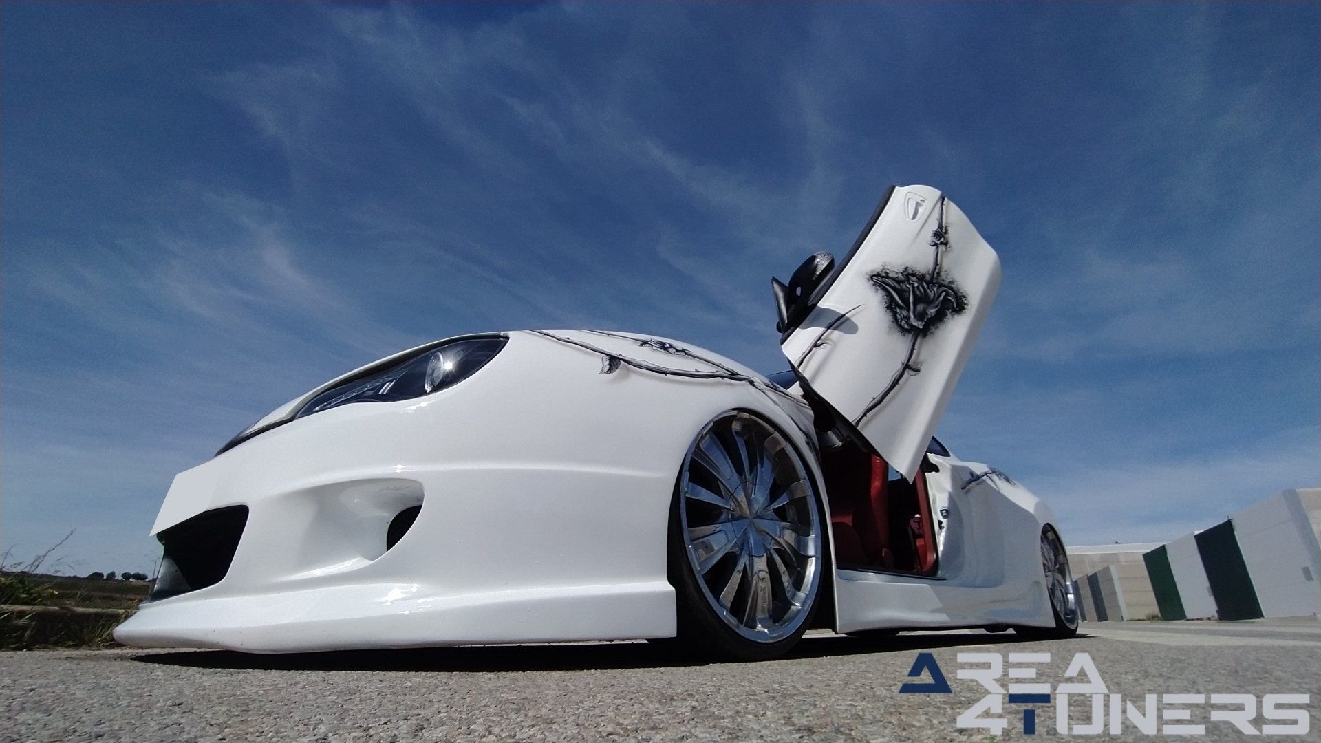 Imagen reportaje coche Tuning Hyundai Coupé White Rose Imagen perteneciente al reportaje de coche Tuning, de la revista Area4tuners sobre un Hyundai Coupé