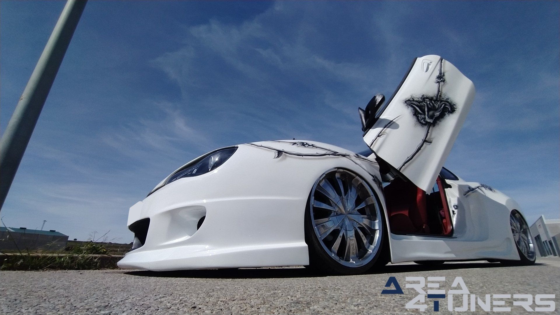 Imagen reportaje coche Tuning Hyundai Coupé White Rose Imagen perteneciente al reportaje de coche Tuning, de la revista Area4tuners sobre un Hyundai Coupé