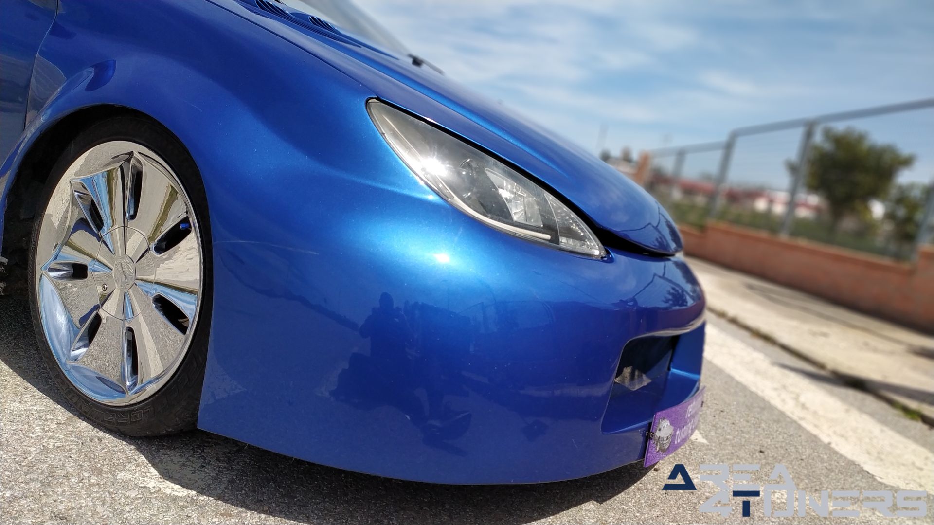 Imagen reportaje coche Tuning Peugeot 206 La Canica Azul Imagen perteneciente al reportaje de coche Tuning, de la revista Area4tuners sobre un Peugeot 206