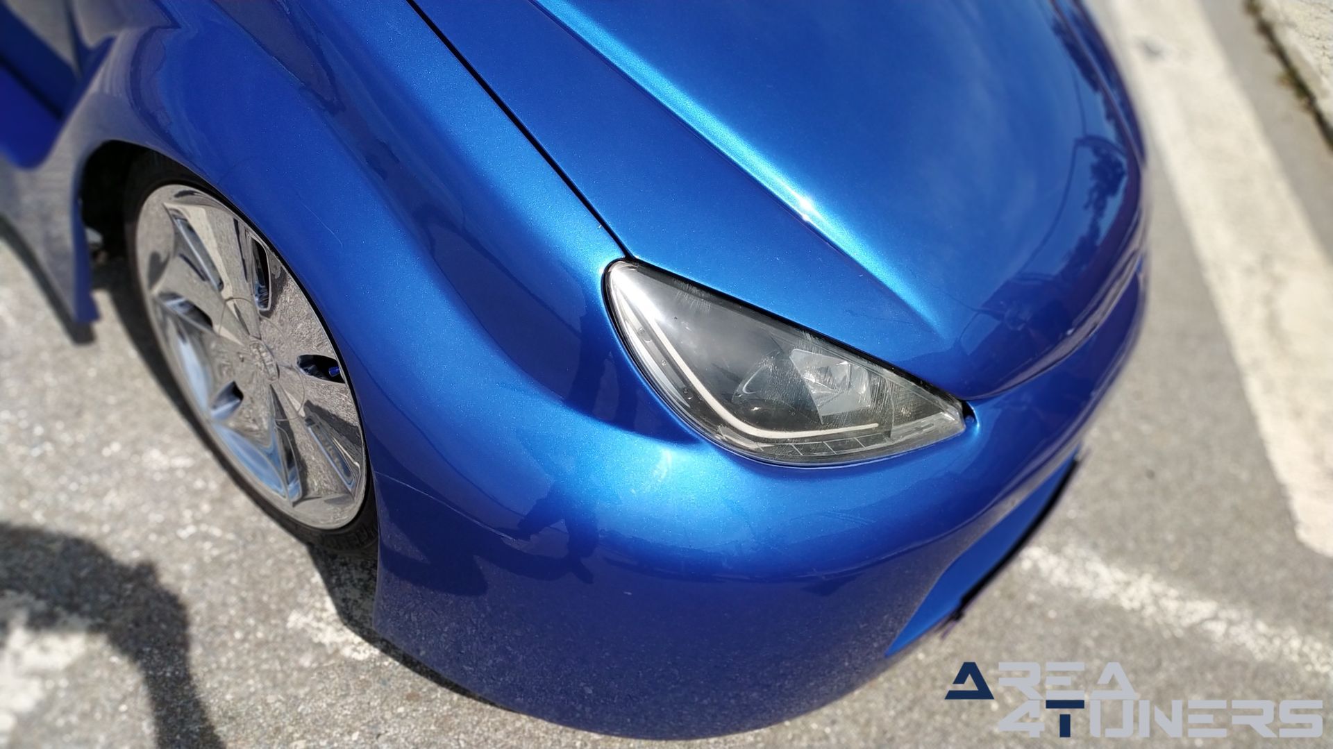 Imagen reportaje coche Tuning Peugeot 206 La Canica Azul Imagen perteneciente al reportaje de coche Tuning, de la revista Area4tuners sobre un Peugeot 206