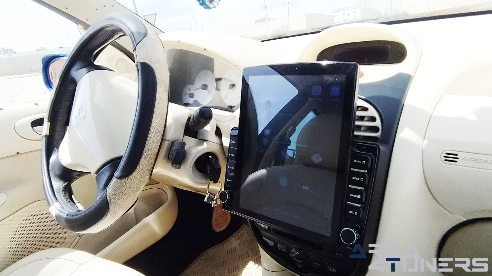 Imagen reportaje coche Tuning Peugeot 206 La Canica Azul Imagen perteneciente al reportaje de coche Tuning, de la revista Area4tuners sobre un Peugeot 206