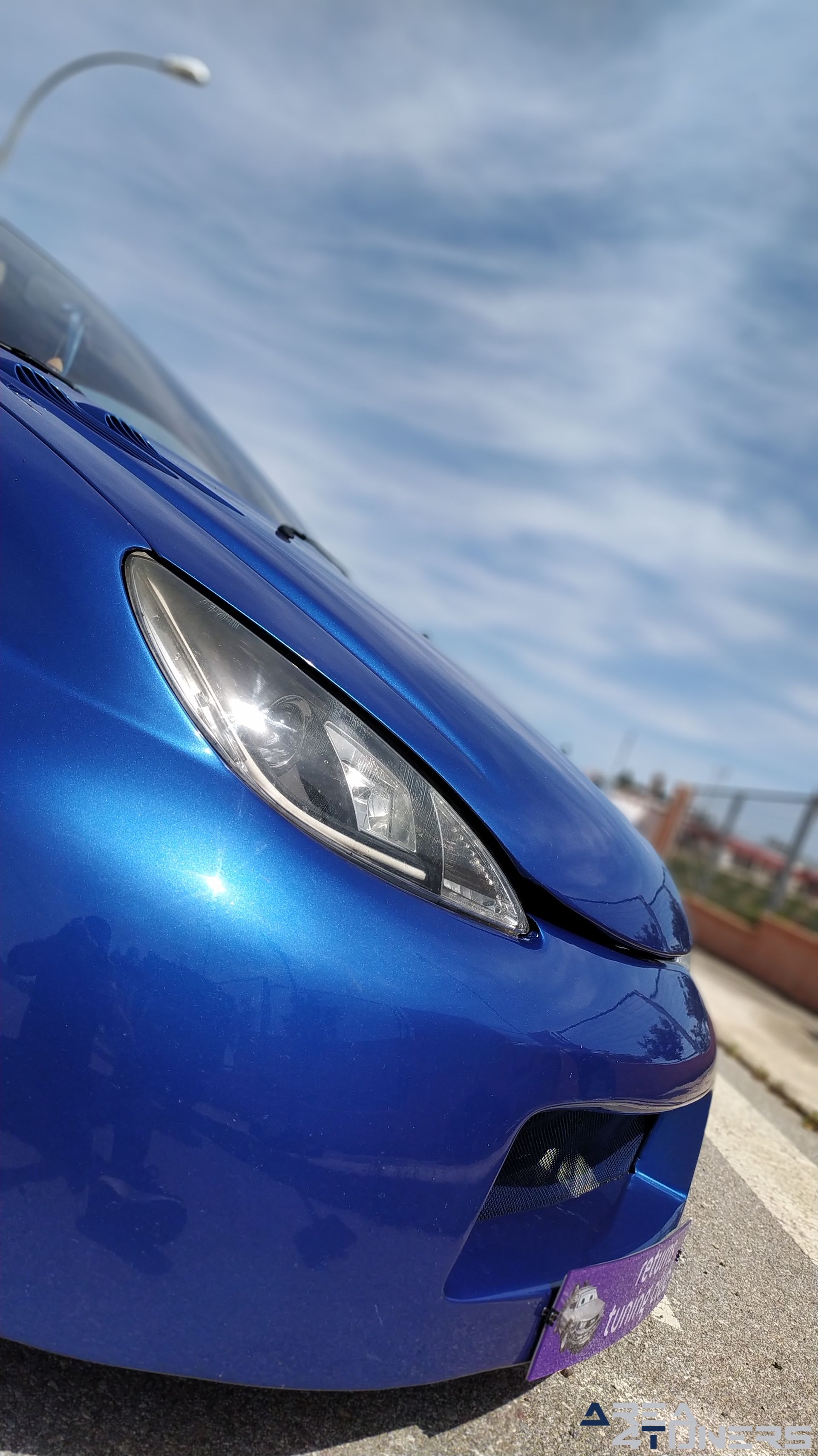 Imagen reportaje coche Tuning Peugeot 206 La Canica Azul Imagen perteneciente al reportaje de coche Tuning, de la revista Area4tuners sobre un Peugeot 206