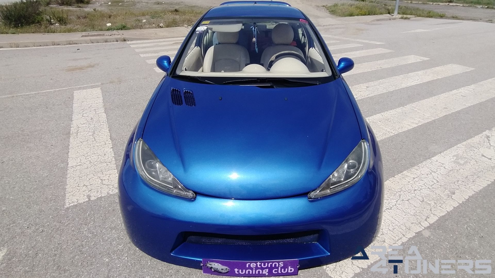 Imagen reportaje coche Tuning Peugeot 206 La Canica Azul Imagen perteneciente al reportaje de coche Tuning, de la revista Area4tuners sobre un Peugeot 206