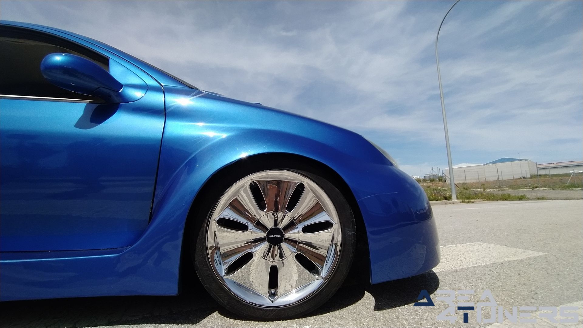 Imagen reportaje coche Tuning Peugeot 206 La Canica Azul Imagen perteneciente al reportaje de coche Tuning, de la revista Area4tuners sobre un Peugeot 206