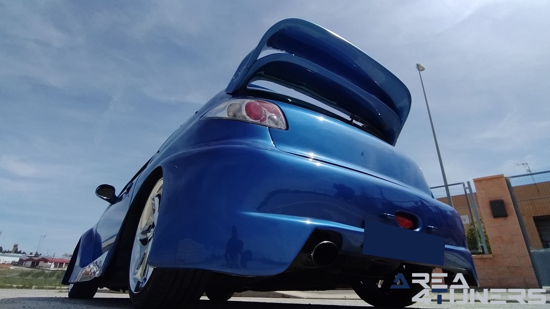 Imagen reportaje coche Tuning Peugeot 206 La Canica Azul Imagen perteneciente al reportaje de coche Tuning, de la revista Area4tuners sobre un Peugeot 206