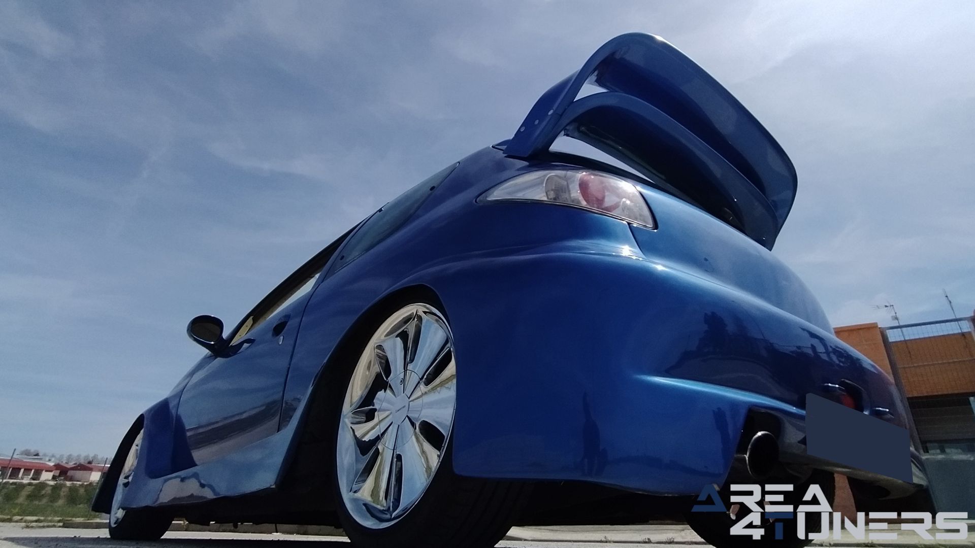 Imagen reportaje coche Tuning Peugeot 206 La Canica Azul Imagen perteneciente al reportaje de coche Tuning, de la revista Area4tuners sobre un Peugeot 206