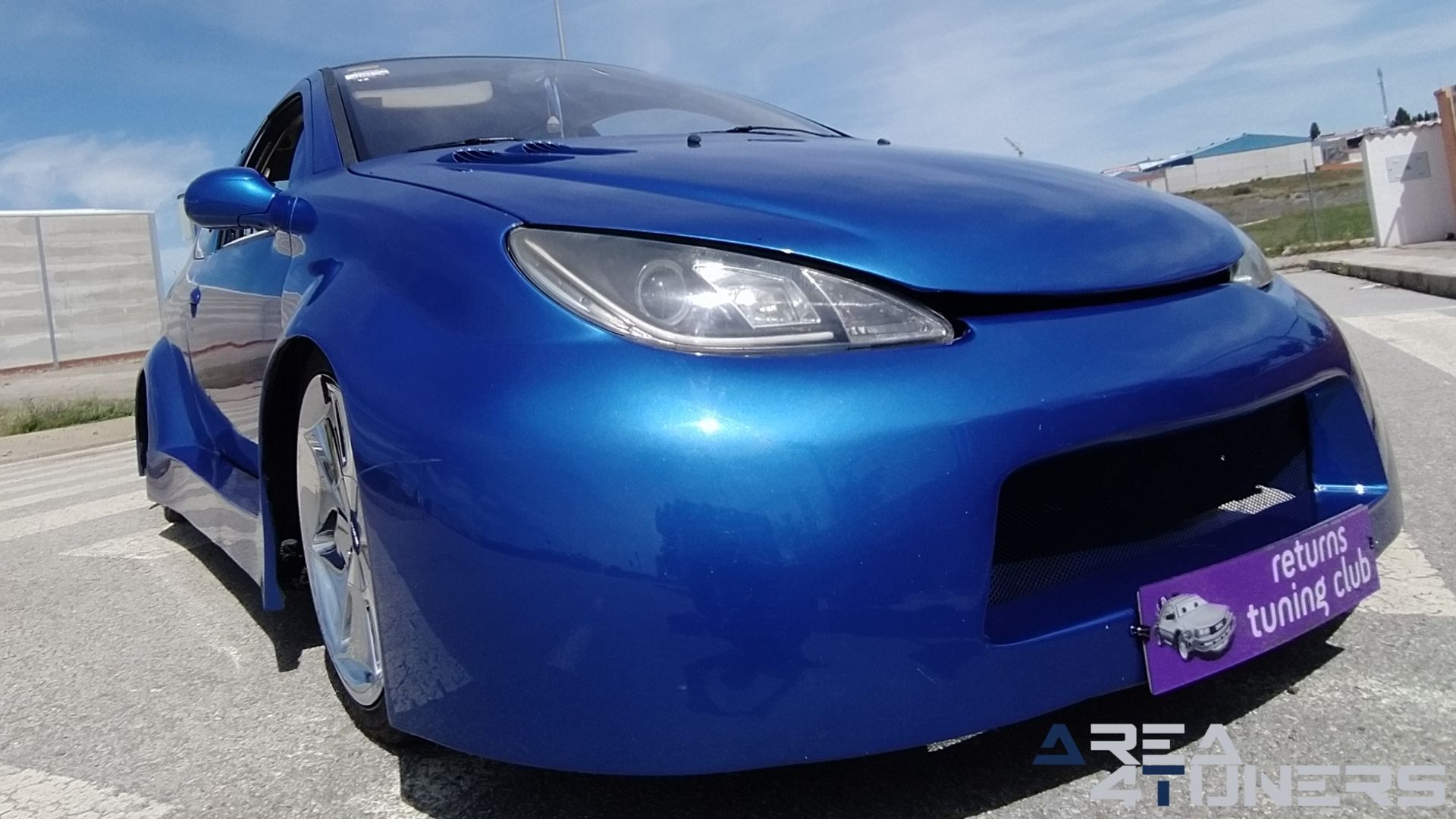 Imagen reportaje coche Tuning Peugeot 206 La Canica Azul Imagen perteneciente al reportaje de coche Tuning, de la revista Area4tuners sobre un Peugeot 206