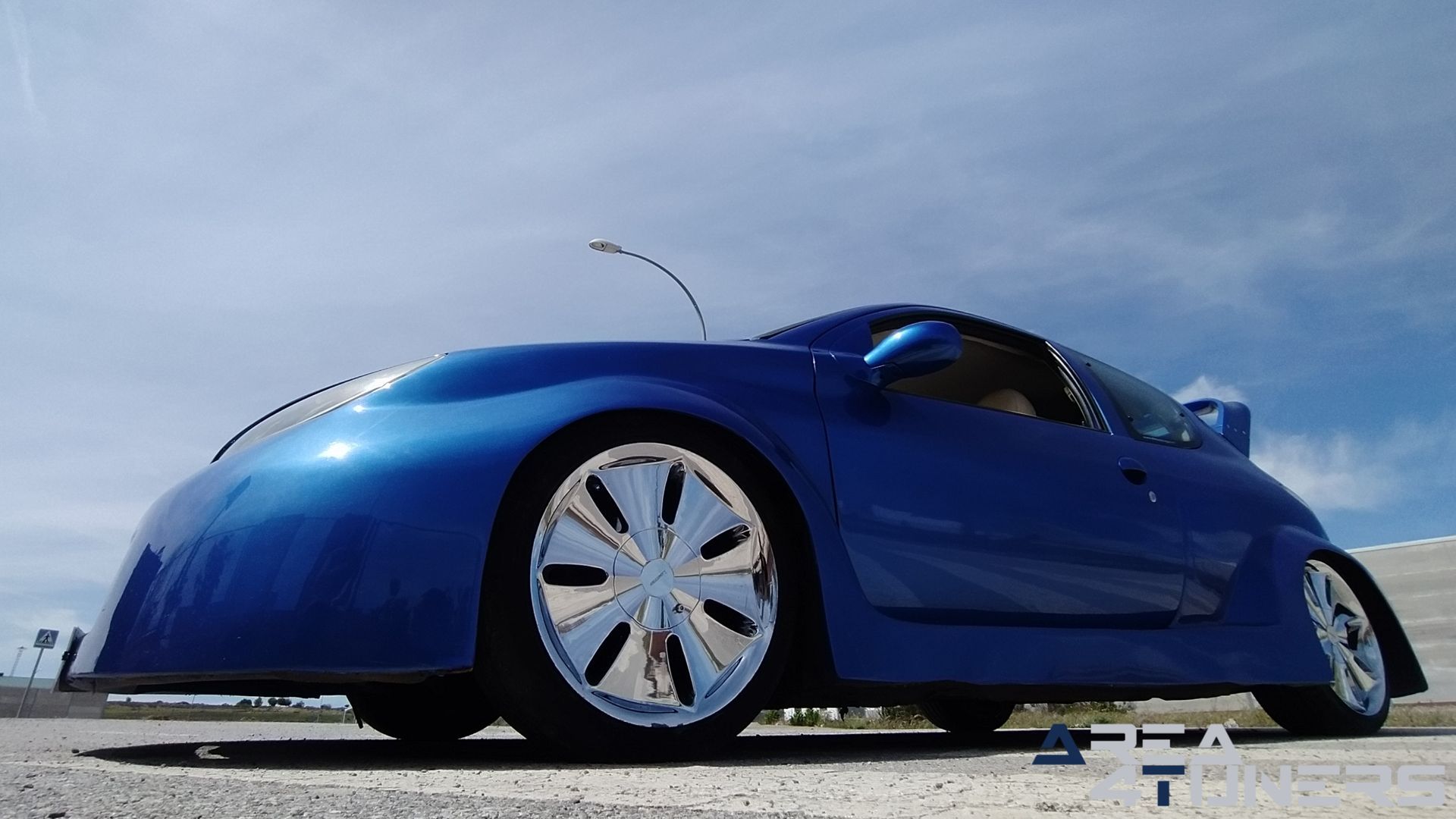 Imagen reportaje coche Tuning Peugeot 206 La Canica Azul Imagen perteneciente al reportaje de coche Tuning, de la revista Area4tuners sobre un Peugeot 206
