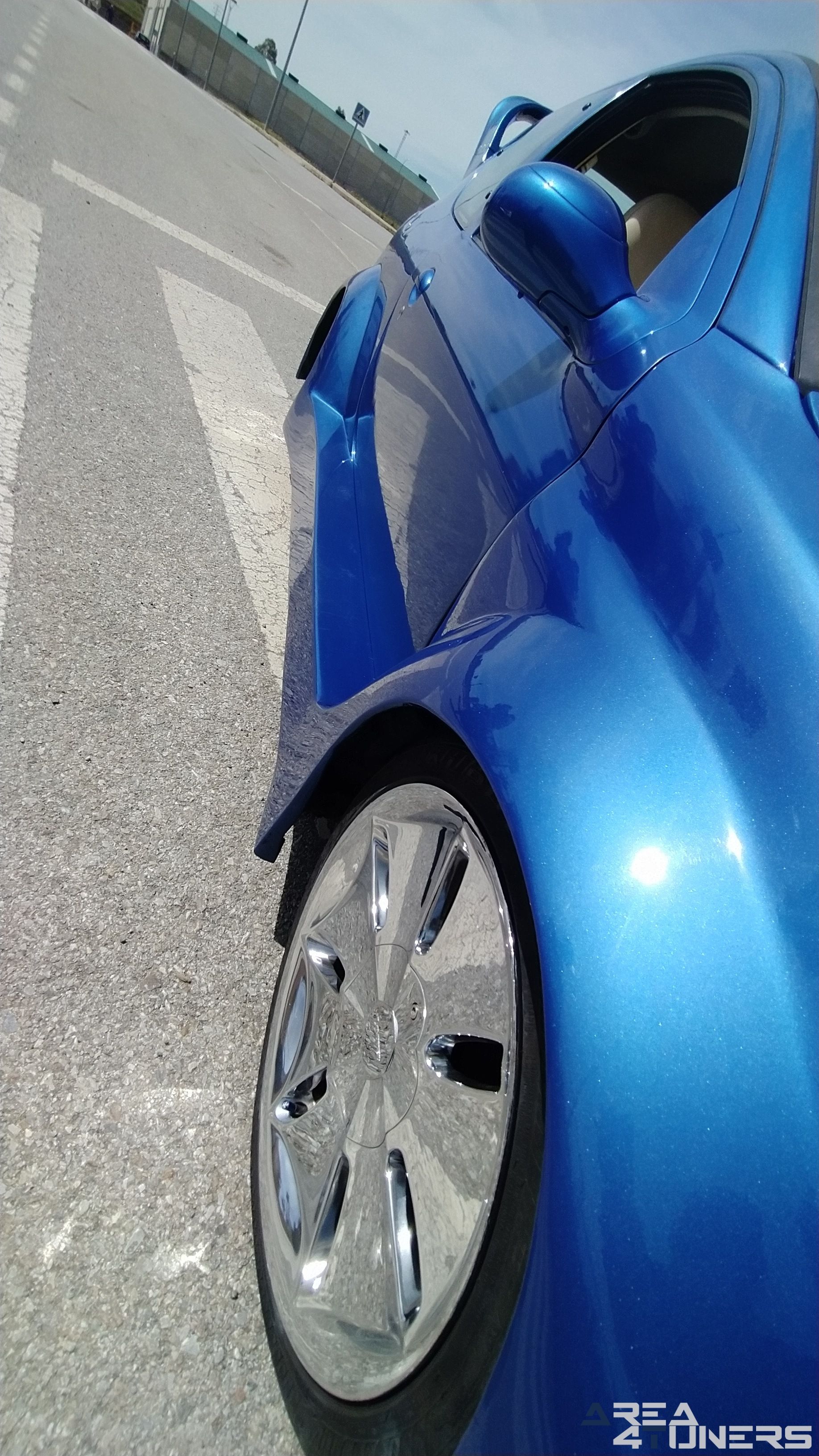 Imagen reportaje coche Tuning Peugeot 206 La Canica Azul Imagen perteneciente al reportaje de coche Tuning, de la revista Area4tuners sobre un Peugeot 206