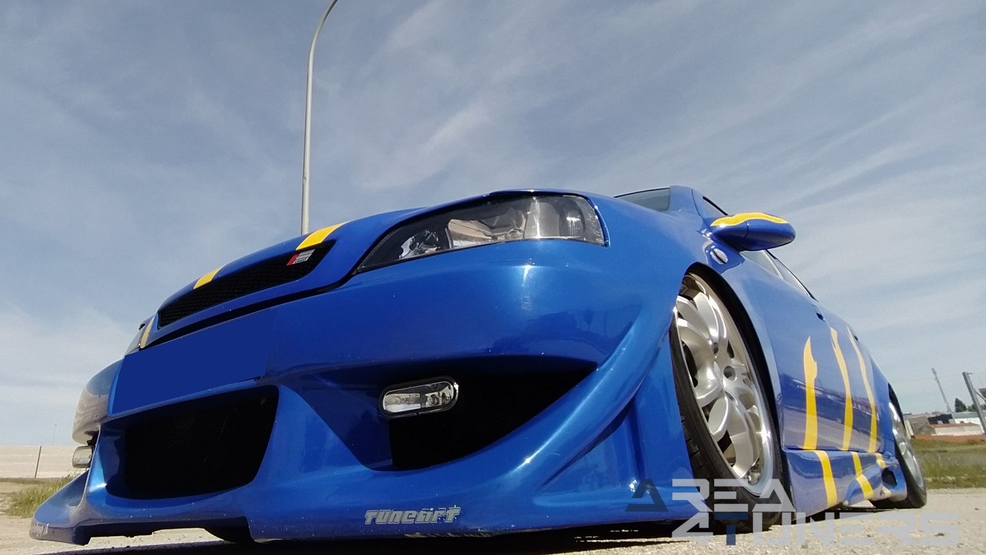 Imagen reportaje coche Tuning Opel Astra Tuneart Imagen perteneciente al reportaje de coche Tuning, de la revista Area4tuners sobre un Opel Astra