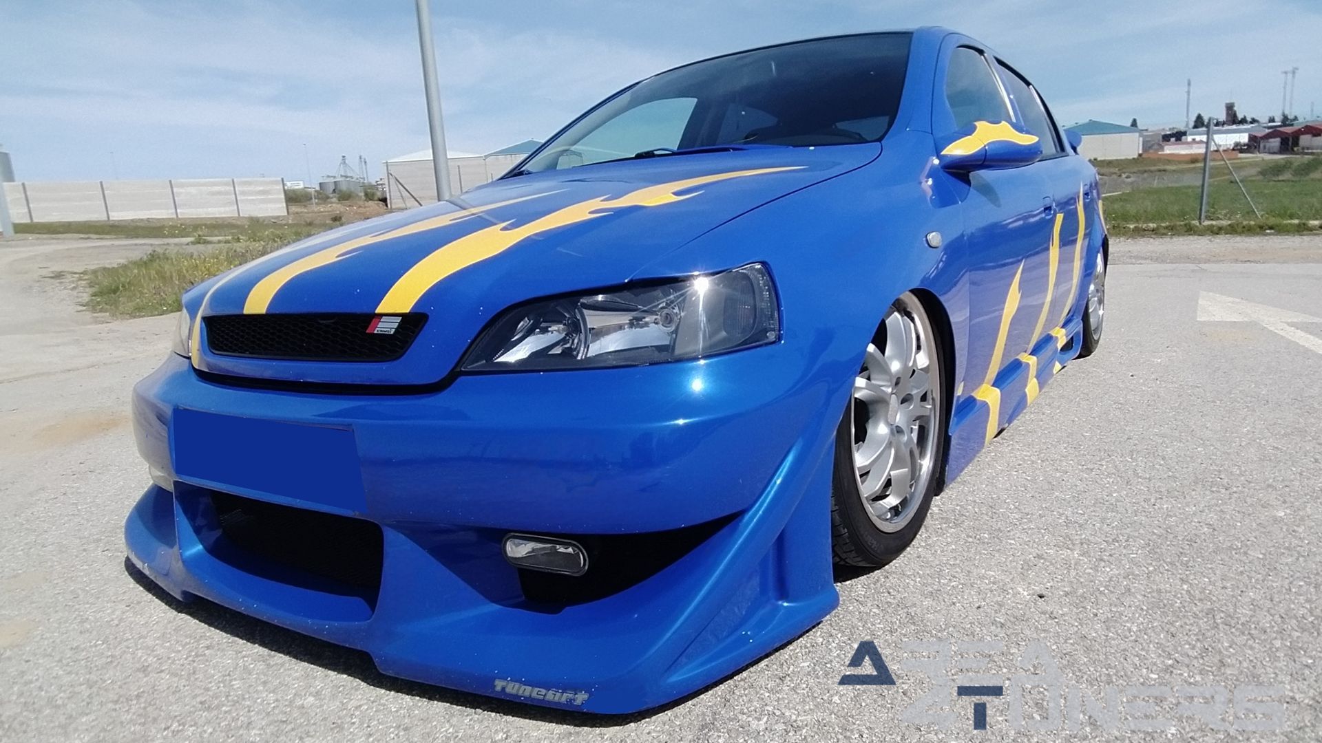 Imagen reportaje coche Tuning Opel Astra Tuneart Imagen perteneciente al reportaje de coche Tuning, de la revista Area4tuners sobre un Opel Astra