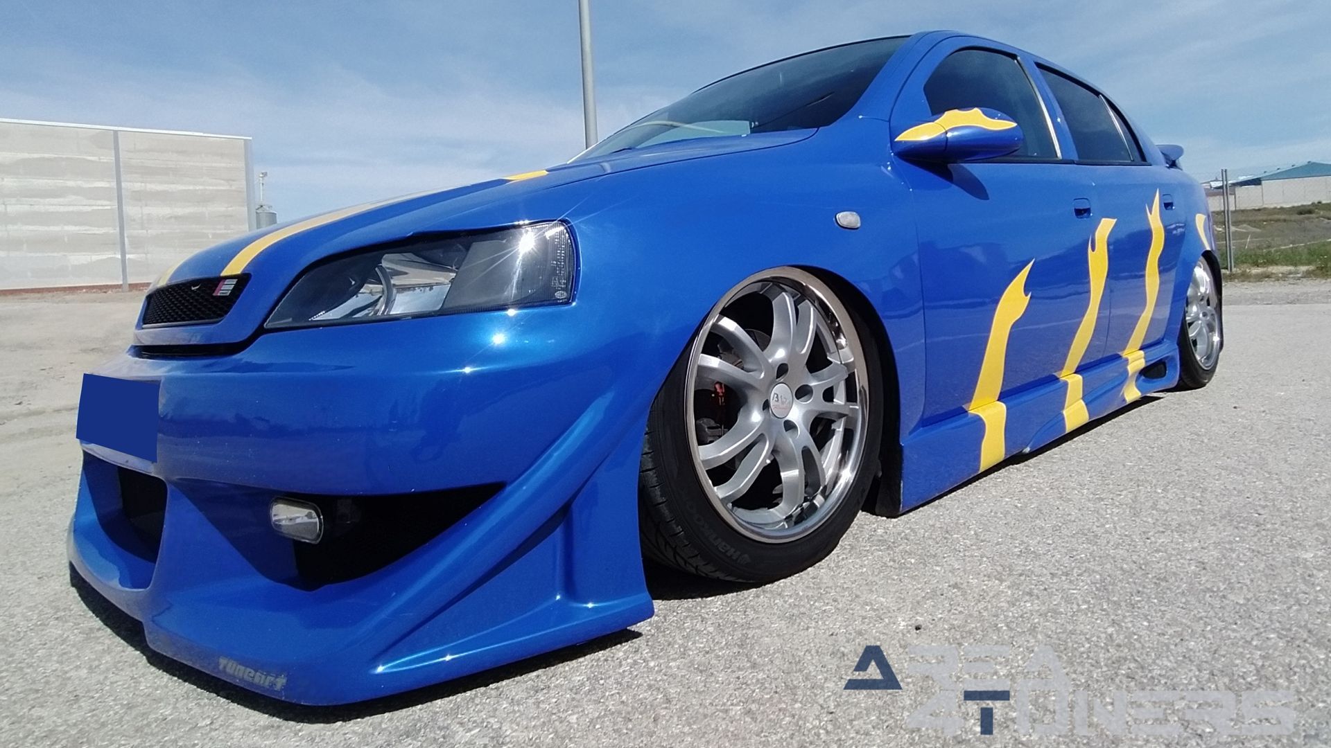Imagen reportaje coche Tuning Opel Astra Tuneart Imagen perteneciente al reportaje de coche Tuning, de la revista Area4tuners sobre un Opel Astra