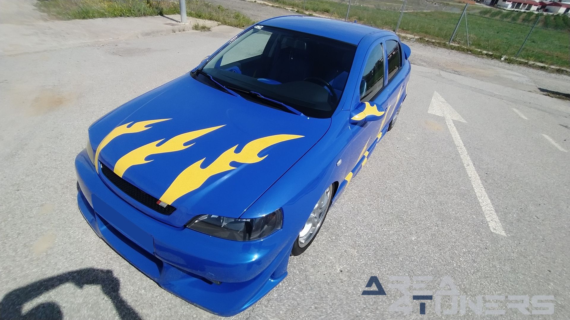 Imagen reportaje coche Tuning Opel Astra Tuneart Imagen perteneciente al reportaje de coche Tuning, de la revista Area4tuners sobre un Opel Astra