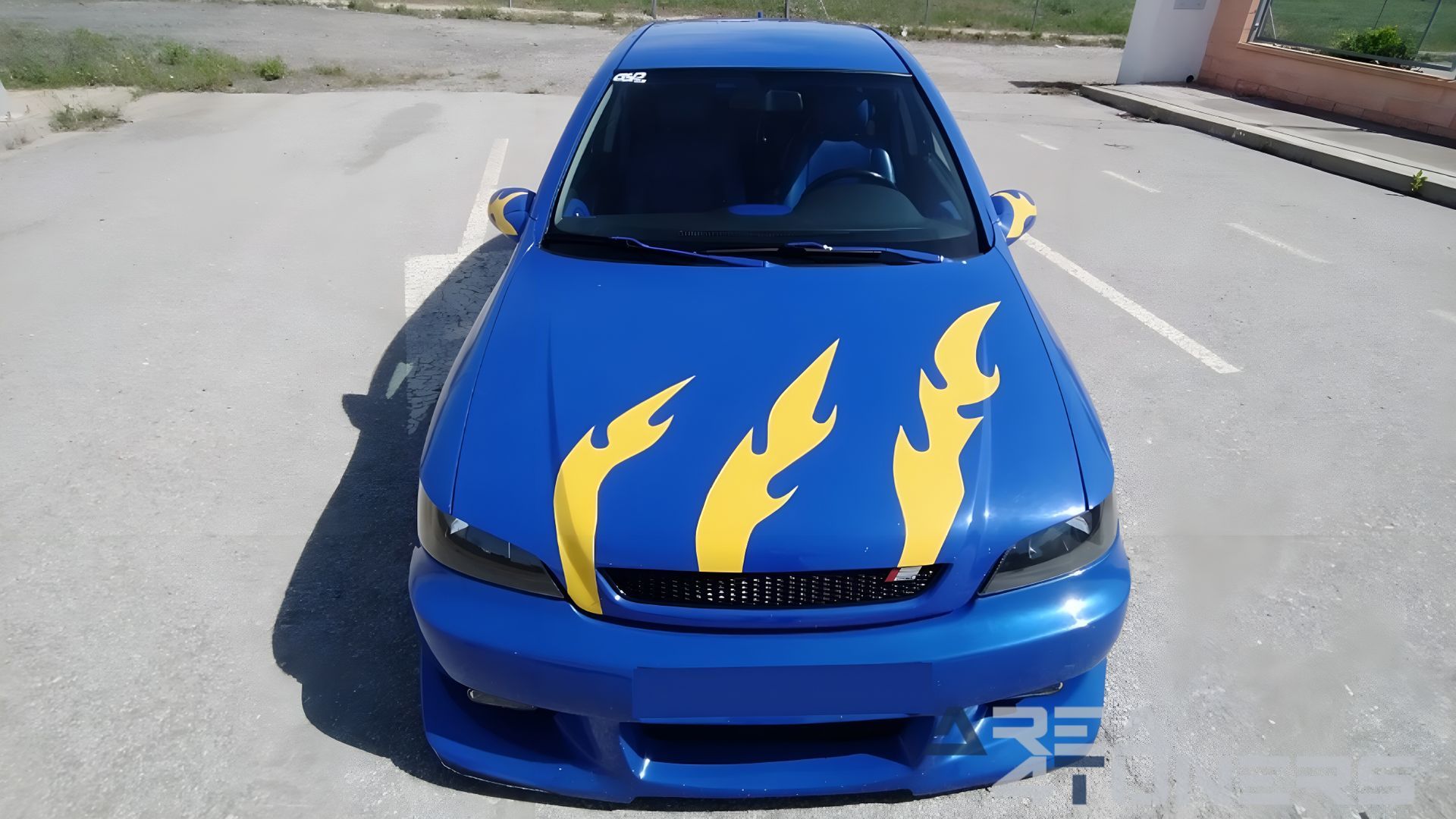 Imagen reportaje coche Tuning Opel Astra Tuneart Imagen perteneciente al reportaje de coche Tuning, de la revista Area4tuners sobre un Opel Astra