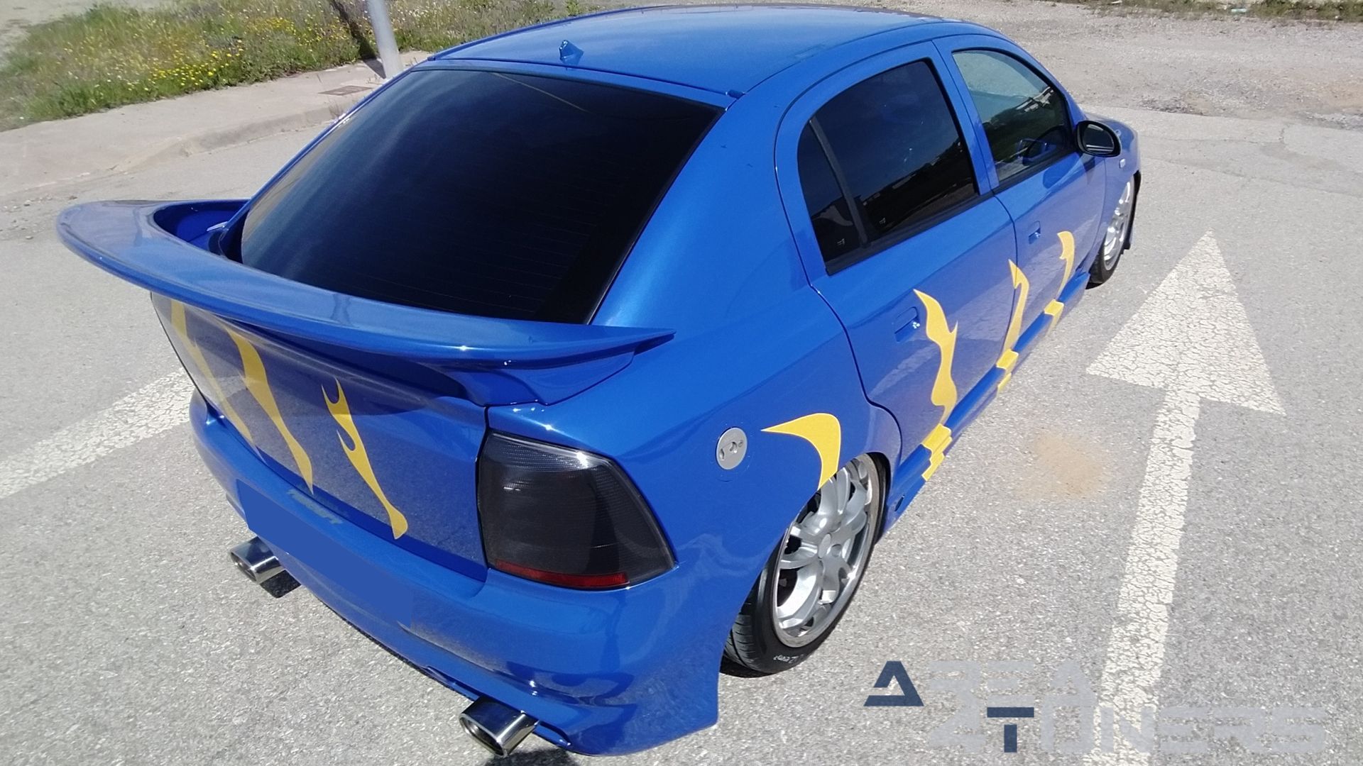 Imagen reportaje coche Tuning Peugeot 206 La Canica Azul Imagen perteneciente al reportaje de coche Tuning, de la revista Area4tuners sobre un Opel Astra