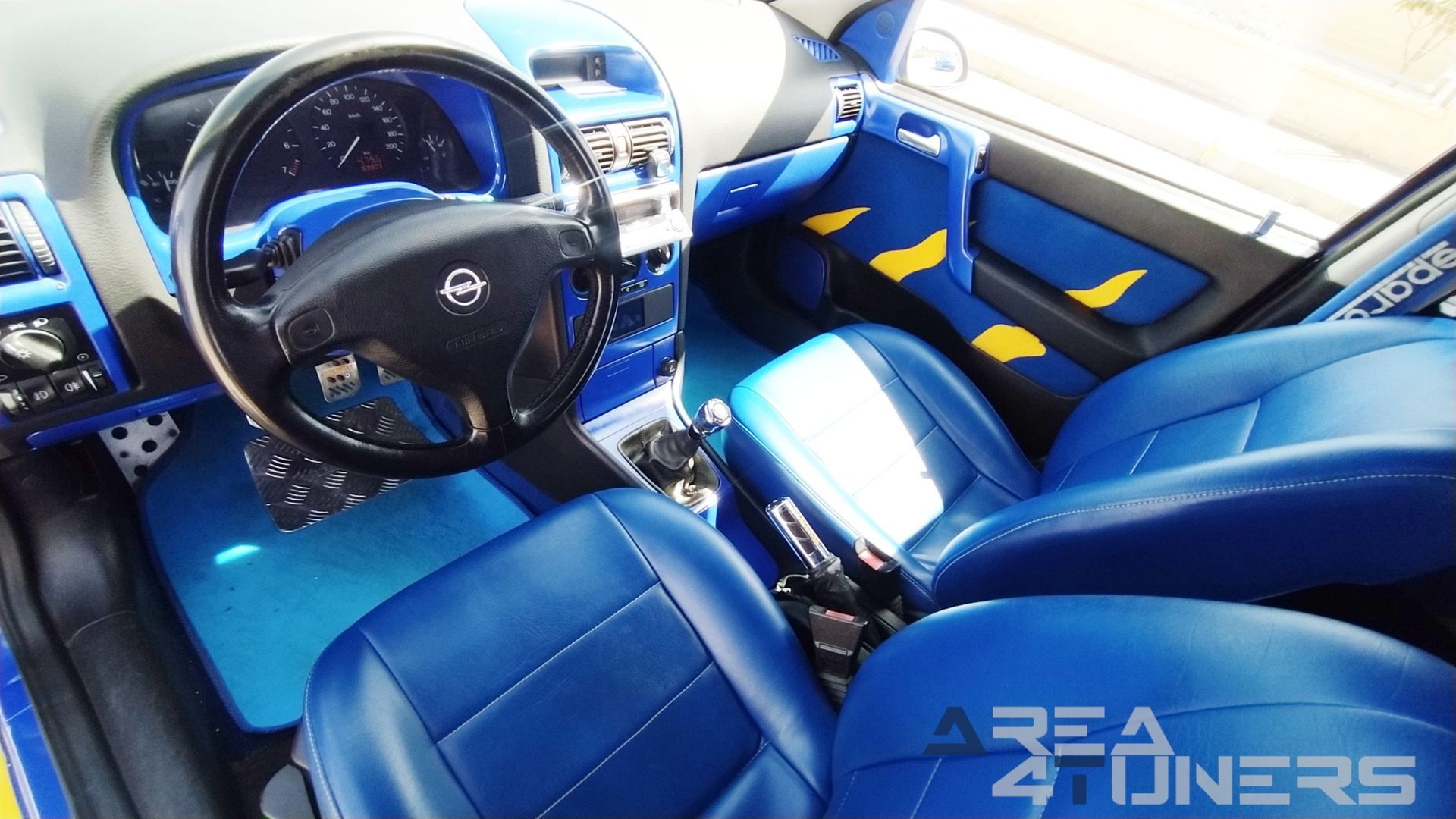 Imagen reportaje coche Tuning Opel Astra Tuneart Imagen perteneciente al reportaje de coche Tuning, de la revista Area4tuners sobre un Opel Astra