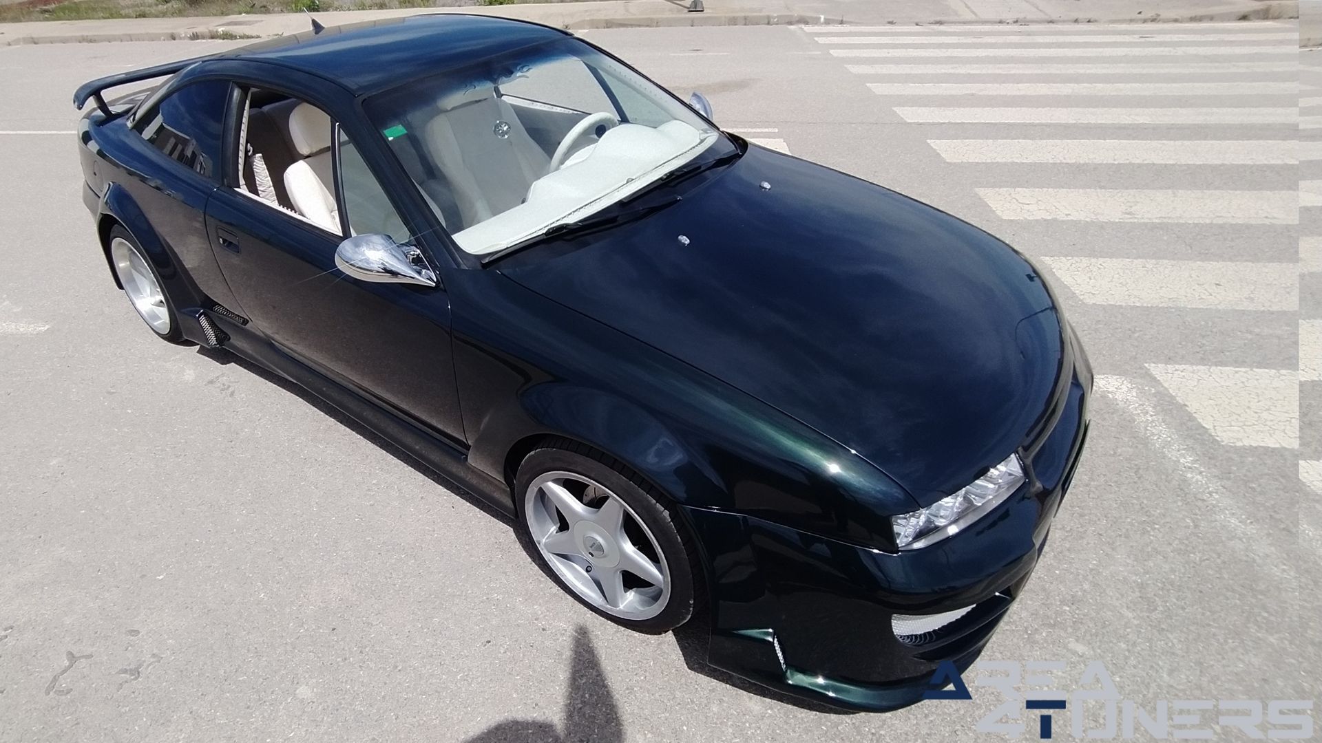 Imagen reportaje coche Tuning Opel Calibra Alligator Imagen perteneciente al reportaje de coche Tuning, de la revista Area4tuners sobre un Opel Calibra