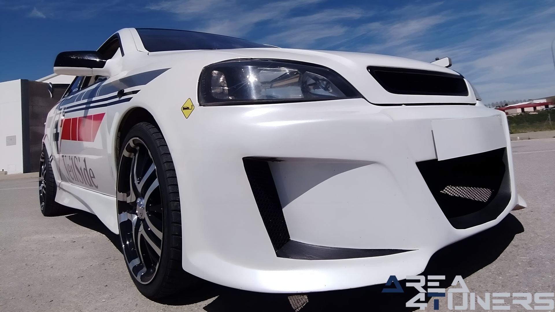 Imagen reportaje coche Tuning Opel Astra VeilSide Imagen perteneciente al reportaje de coche Tuning, de la revista Area4tuners sobre un Opel Astra Bertone