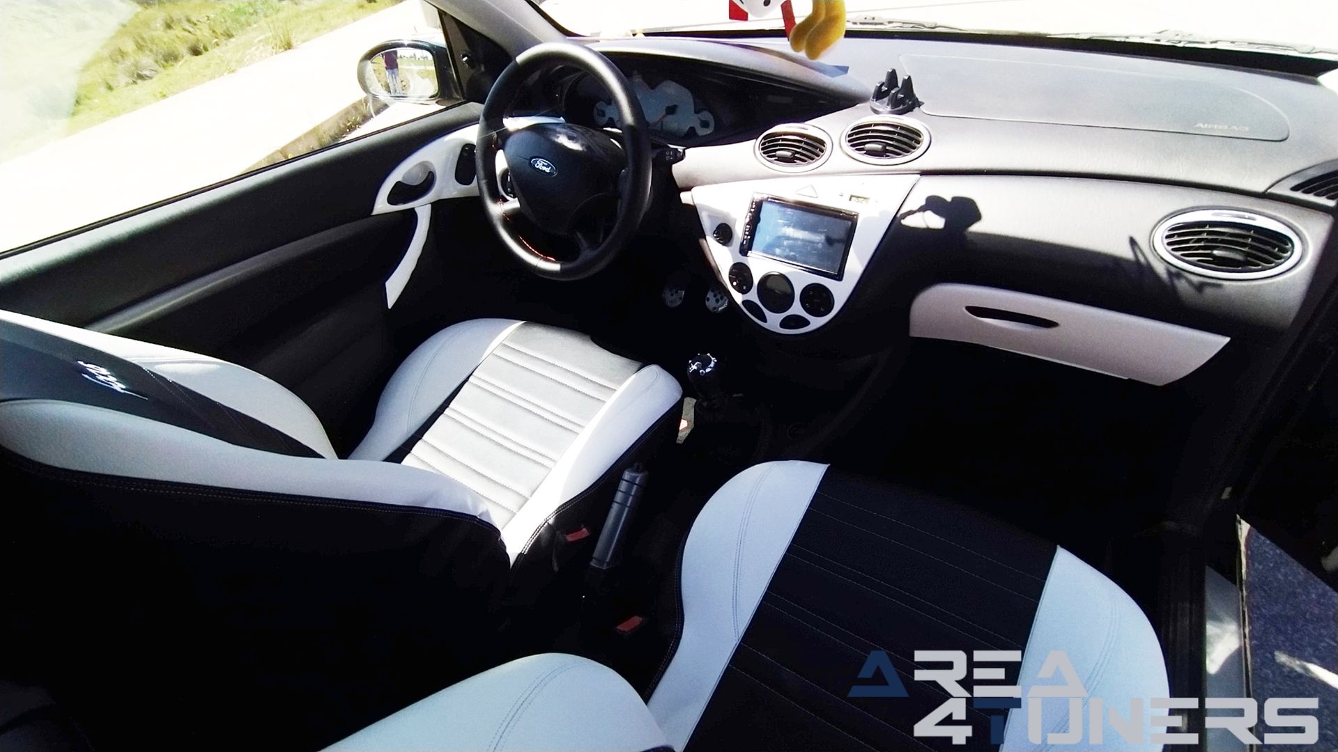 Imagen reportaje coche Tuning Ford Focus Venom Imagen perteneciente al reportaje de coche Tuning, de la revista Area4tuners sobre un Ford Focus