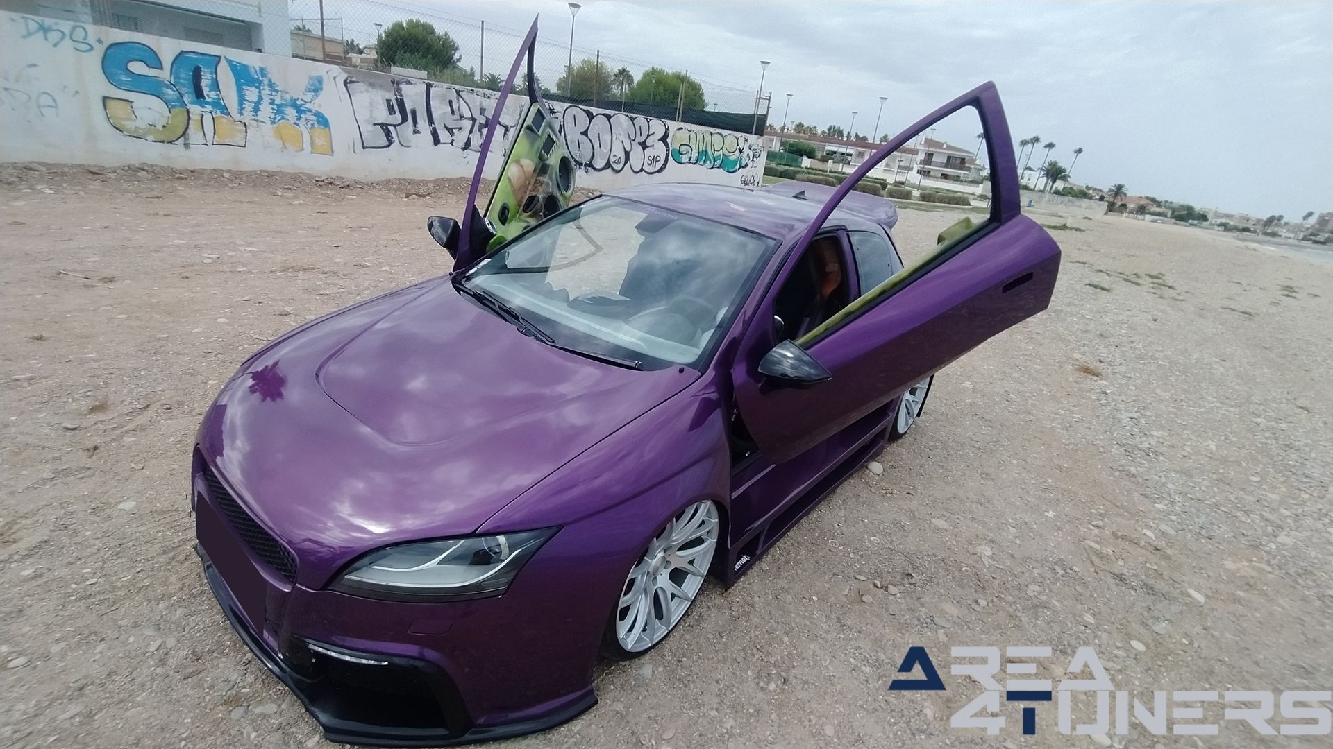 Imagen reportaje coche Peugeot 206 Project Nuclear Imagen perteneciente al reportaje de coche Tuning, de la revista Area4tuners sobre un Peugeot 206