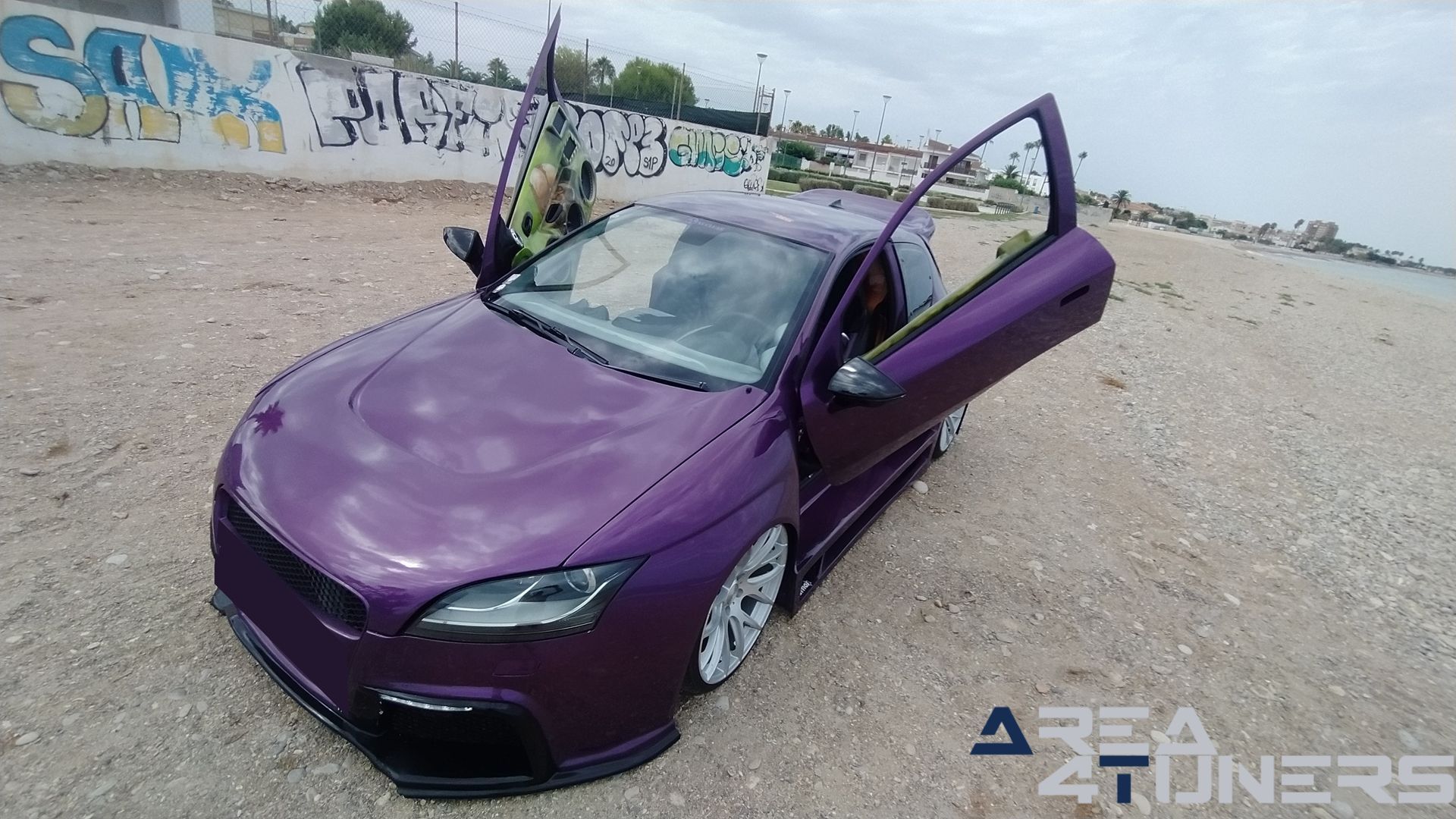 Imagen reportaje coche Peugeot 206 Project Nuclear Imagen perteneciente al reportaje de coche Tuning, de la revista Area4tuners sobre un Peugeot 206