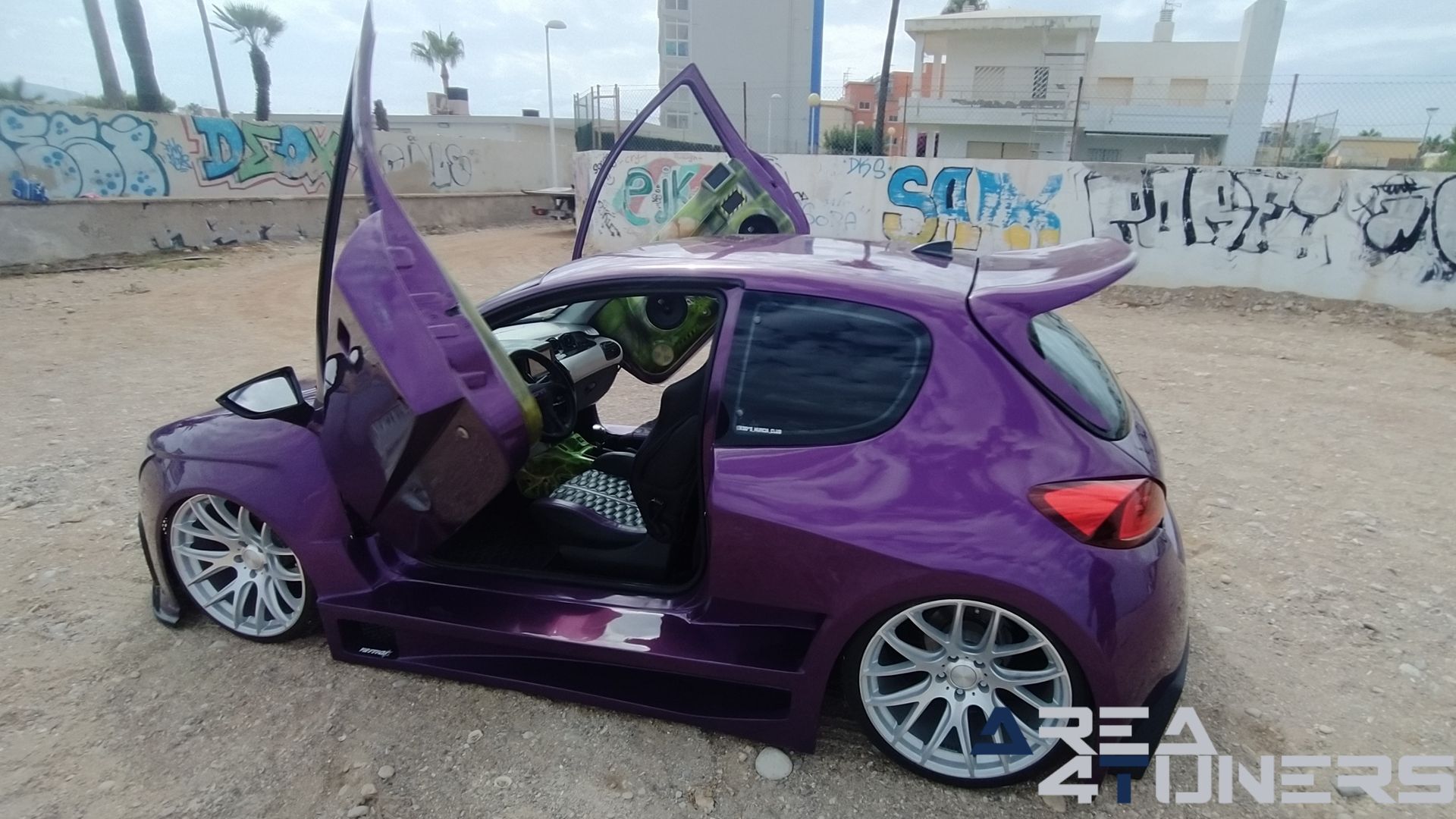 Imagen reportaje coche Peugeot 206 Project Nuclear Imagen perteneciente al reportaje de coche Tuning, de la revista Area4tuners sobre un Peugeot 206