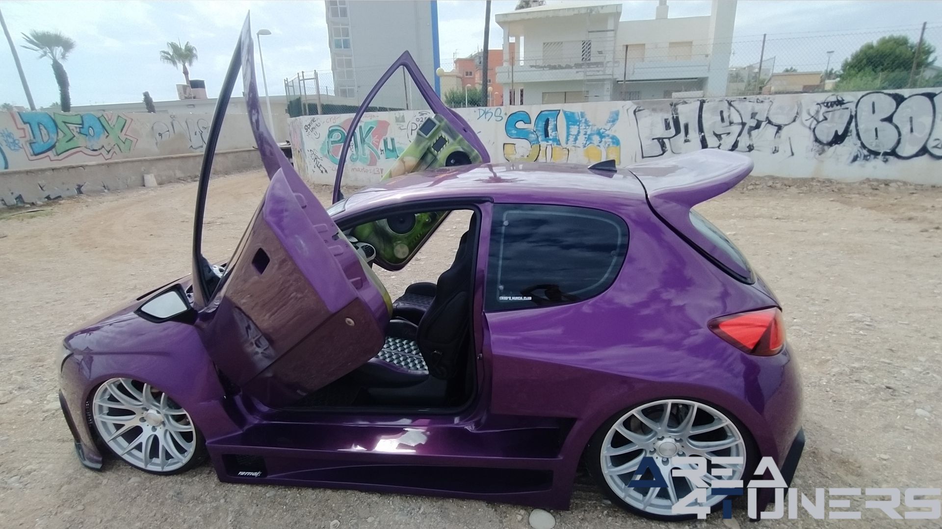 Imagen reportaje coche Peugeot 206 Project Nuclear Imagen perteneciente al reportaje de coche Tuning, de la revista Area4tuners sobre un Peugeot 206