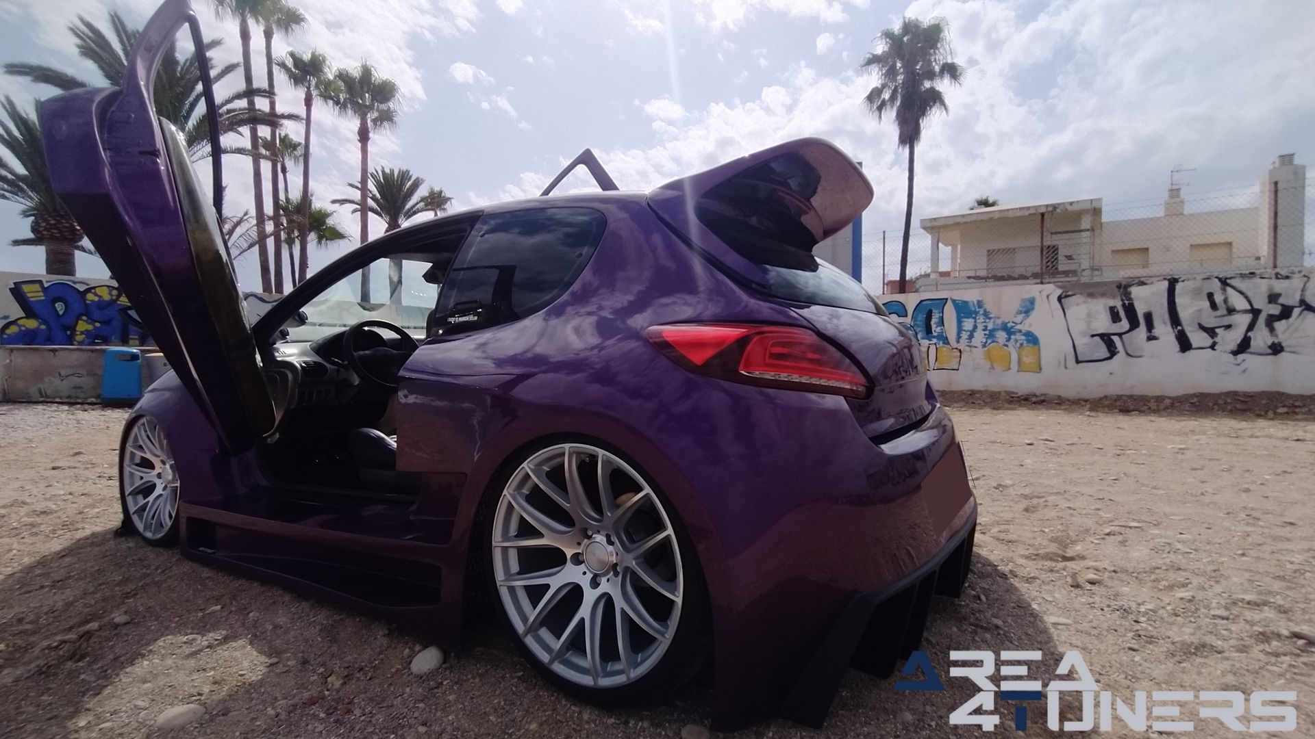 Imagen reportaje coche Peugeot 206 Project Nuclear Imagen perteneciente al reportaje de coche Tuning, de la revista Area4tuners sobre un Peugeot 206