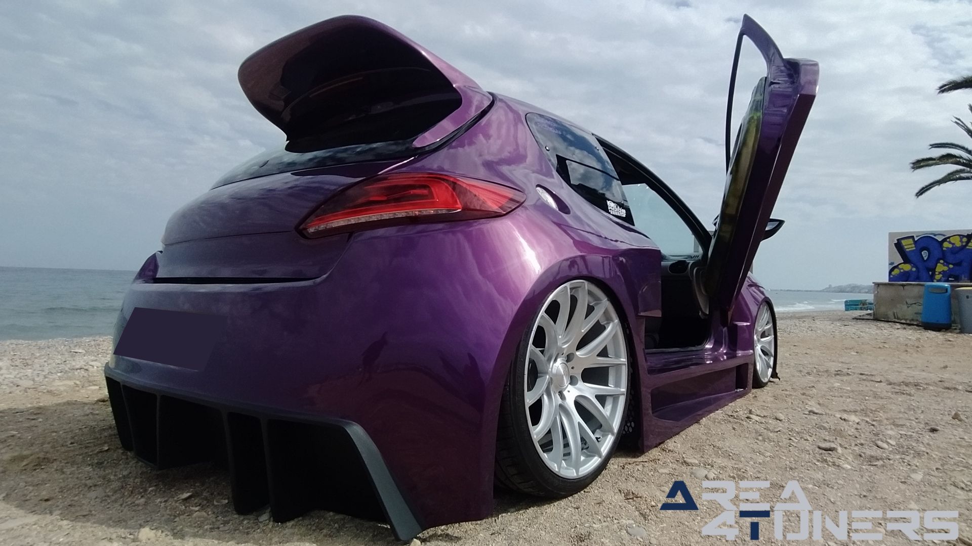 Imagen reportaje coche Peugeot 206 Project Nuclear Imagen perteneciente al reportaje de coche Tuning, de la revista Area4tuners sobre un Peugeot 206