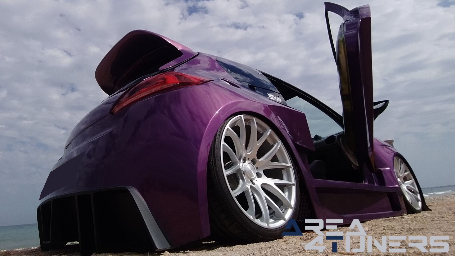 Imagen reportaje coche Peugeot 206 Project Nuclear Imagen perteneciente al reportaje de coche Tuning, de la revista Area4tuners sobre un Peugeot 206