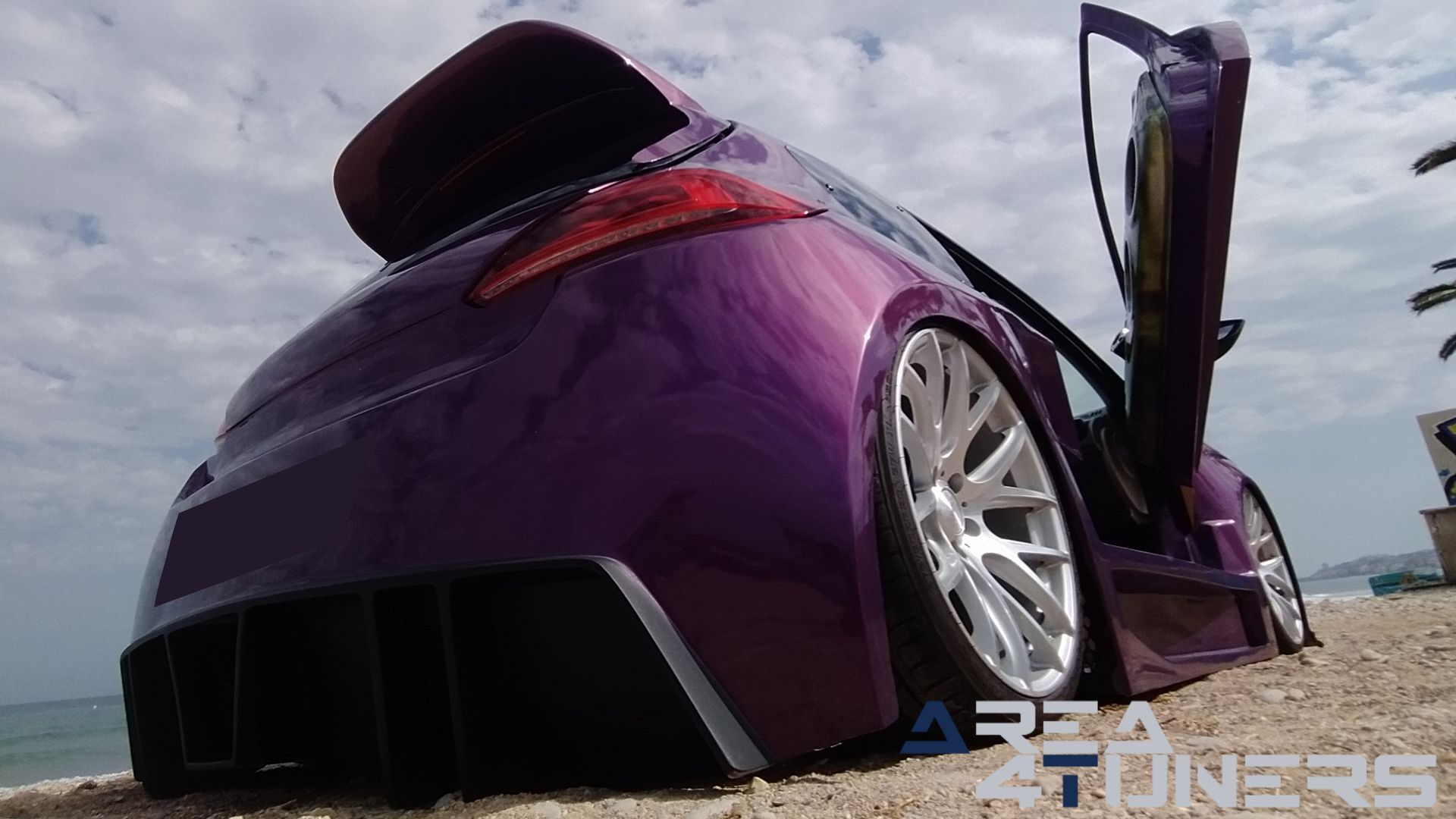 Imagen reportaje coche Peugeot 206 Project Nuclear Imagen perteneciente al reportaje de coche Tuning, de la revista Area4tuners sobre un Peugeot 206