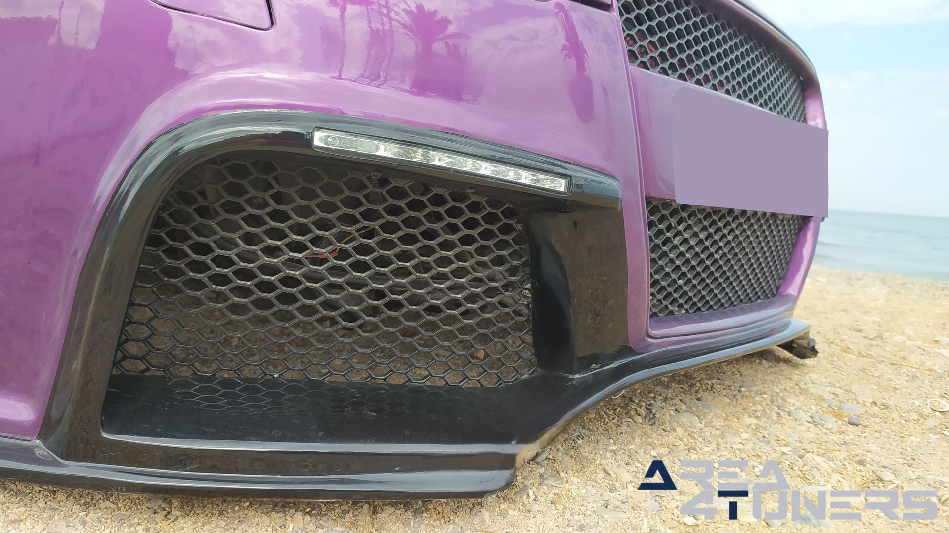 Imagen reportaje coche Tuning Peugeot 206 Project Nuclear Imagen perteneciente al reportaje de coche Tuning, de la revista Area4tuners sobre un Peugeot 206