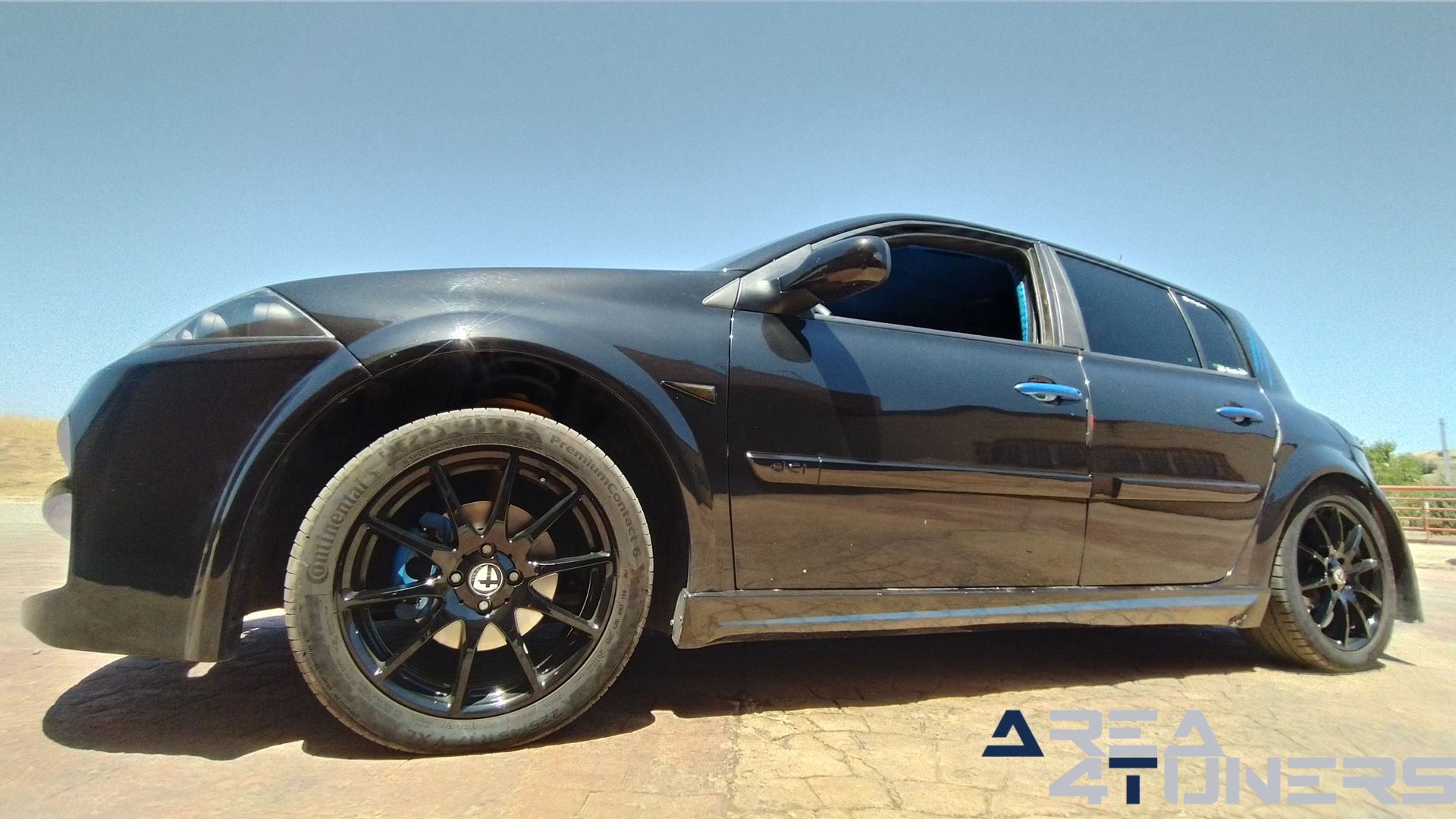 Imagen reportaje coche Tuning Renault Megane Torete Imagen perteneciente al reportaje de coche Tuning, de la revista Area4tuners sobre un Renault Megane