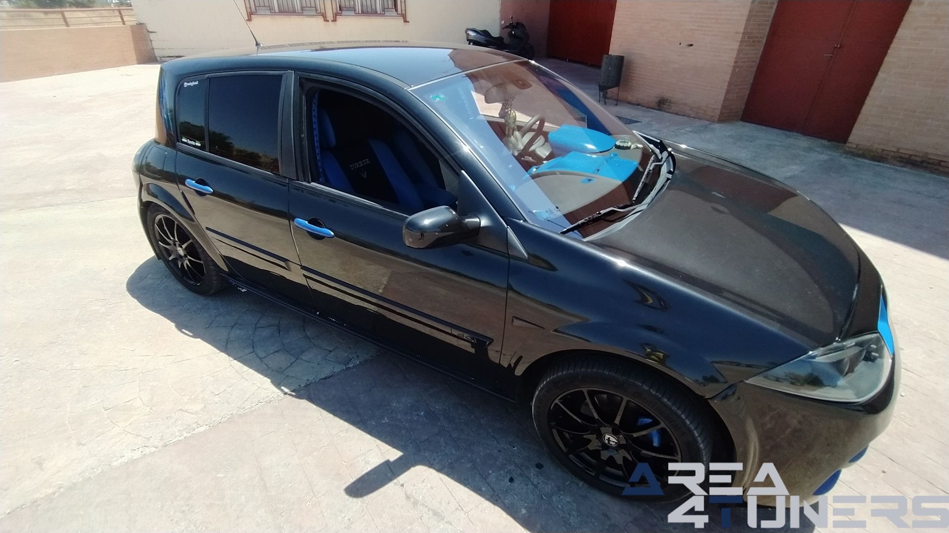 Imagen reportaje coche Tuning Renault Megane Torete Imagen perteneciente al reportaje de coche Tuning, de la revista Area4tuners sobre un Renault Megane