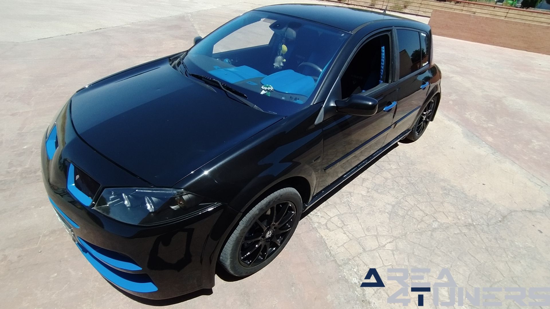 Imagen reportaje coche Tuning Renault Megane Torete Imagen perteneciente al reportaje de coche Tuning, de la revista Area4tuners sobre un Renault Megane