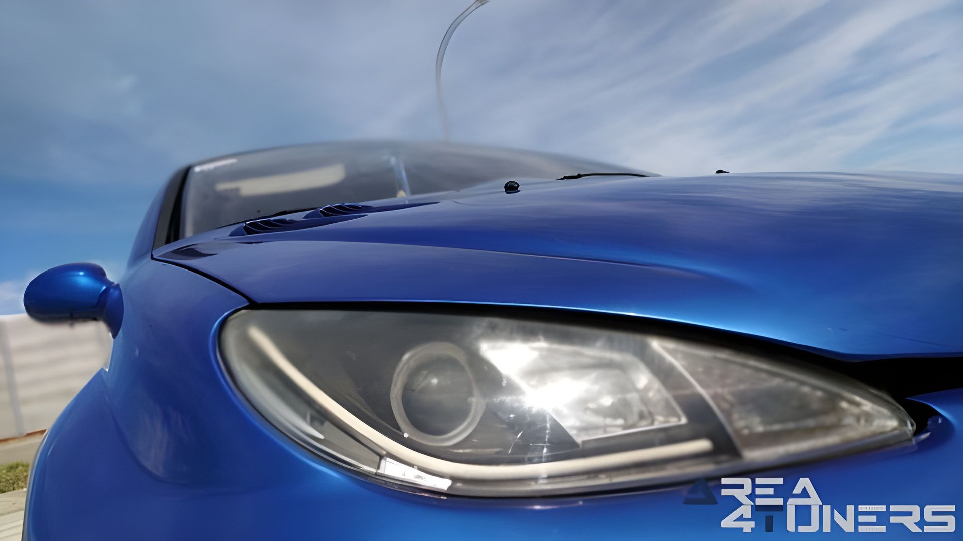 Imagen reportaje coche Tuning Peugeot 206 La Canica Azul Imagen perteneciente al reportaje de coche Tuning, de la revista Area4tuners sobre un Peugeot 206