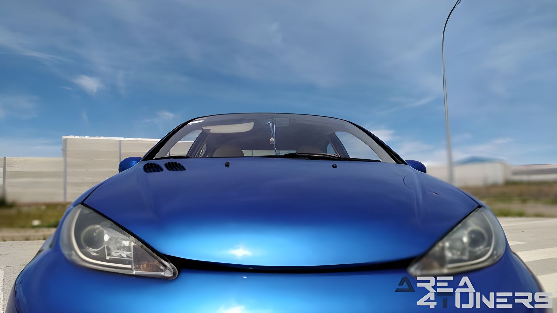 Imagen reportaje coche Tuning Peugeot 206 La Canica Azul Imagen perteneciente al reportaje de coche Tuning, de la revista Area4tuners sobre un Peugeot 206